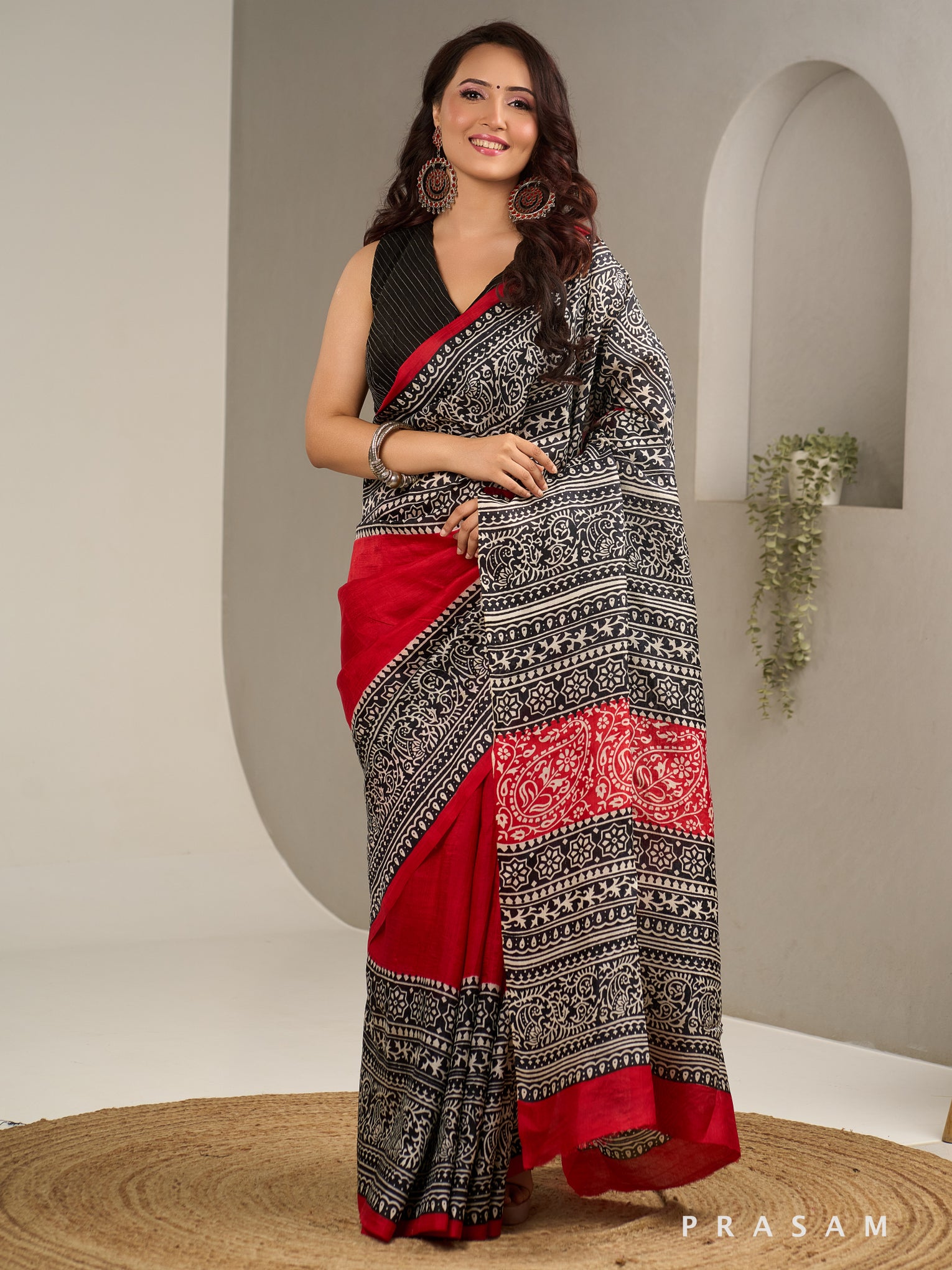 Sanskruti Black & Red Hand Painted Pure Silk Saree.