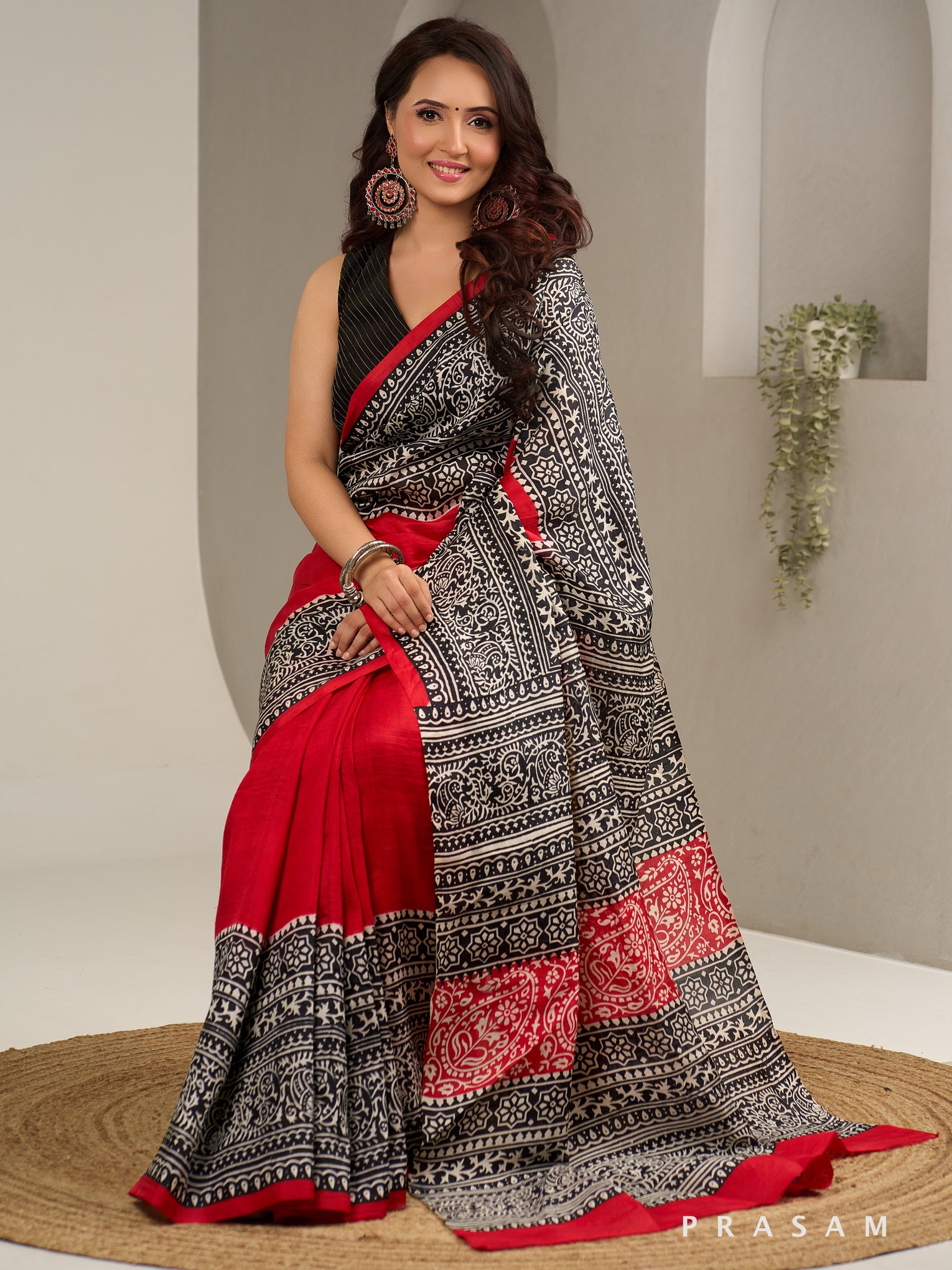 Sanskruti Black & Red Hand Painted Pure Silk Saree.
