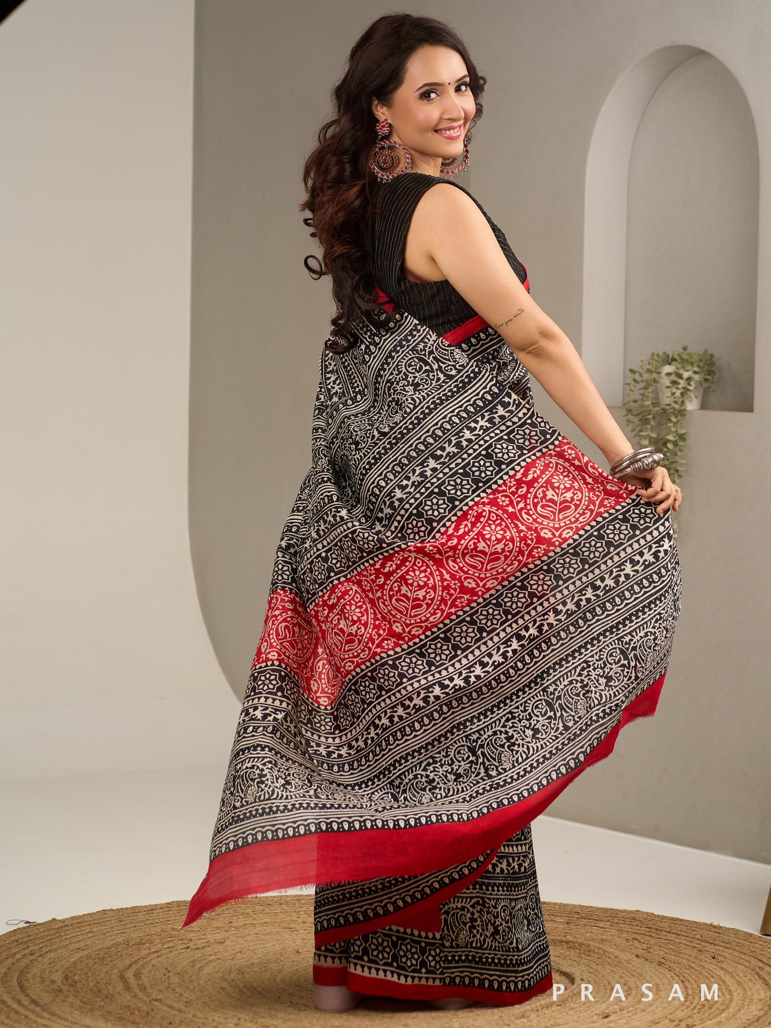 Sanskruti Black & Red Hand Painted Pure Silk Saree.