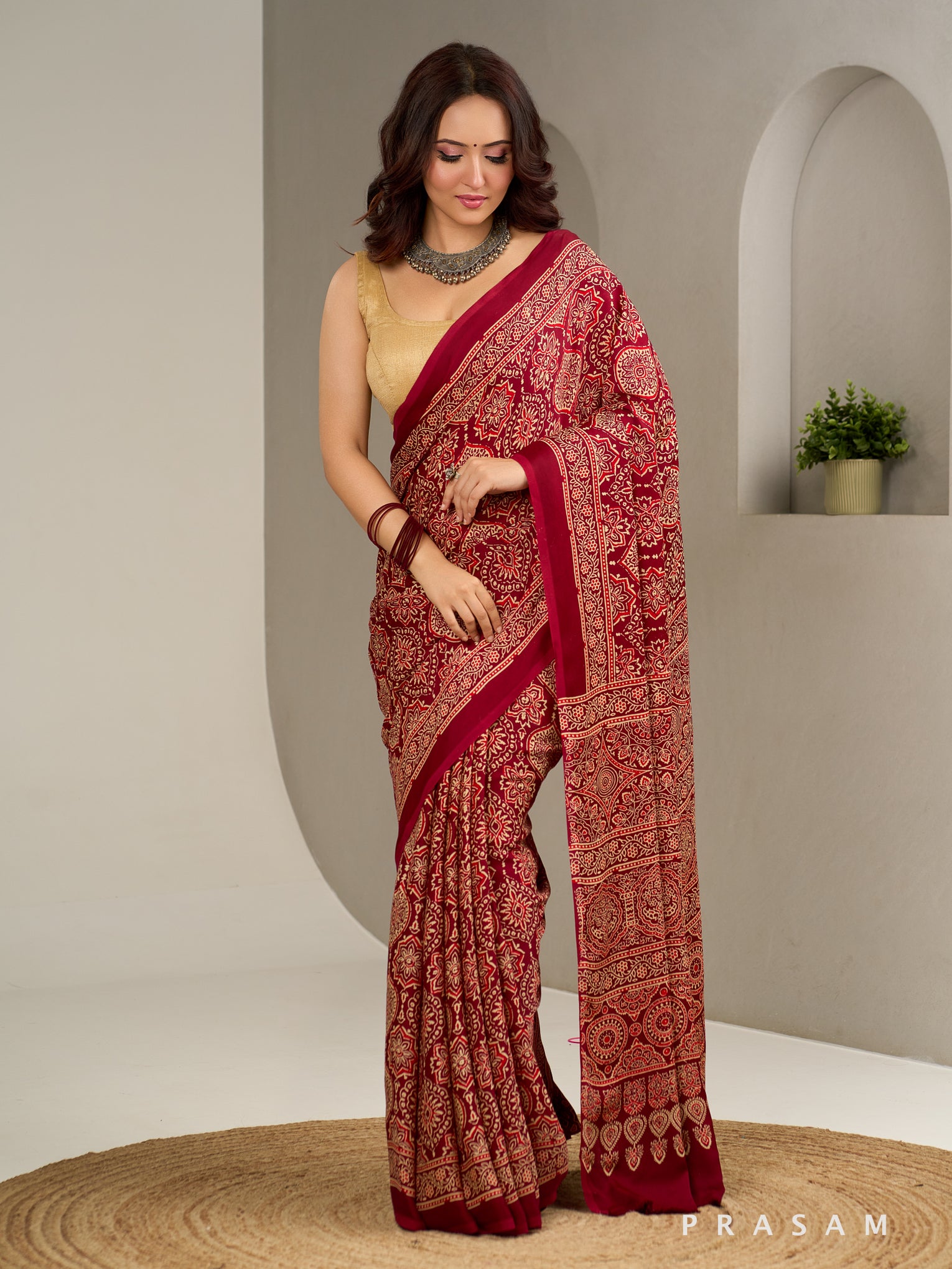 Gulzaar Garnet Ajrakh Modal Silk Saree.