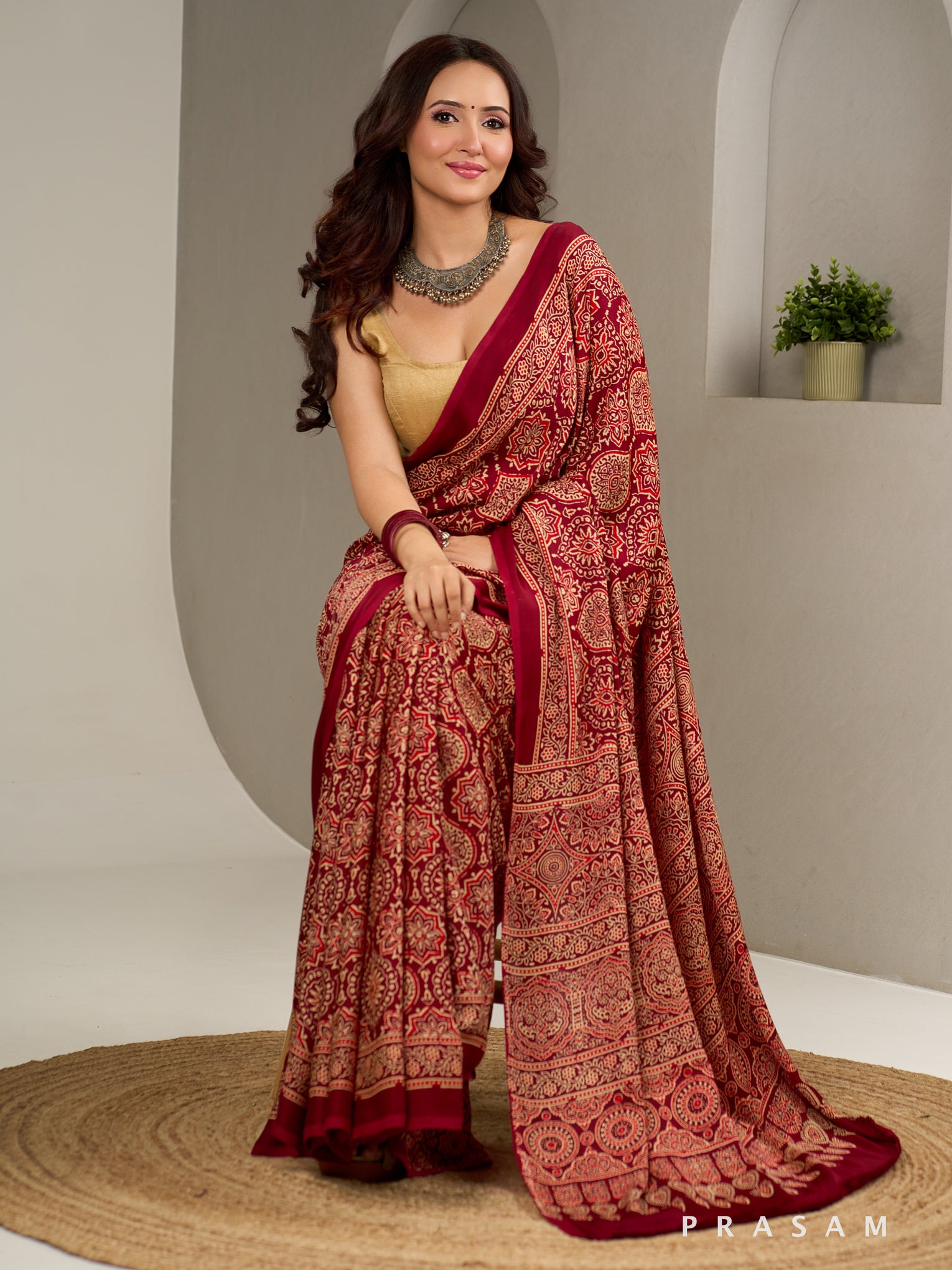 Gulzaar Garnet Ajrakh Modal Silk Saree.