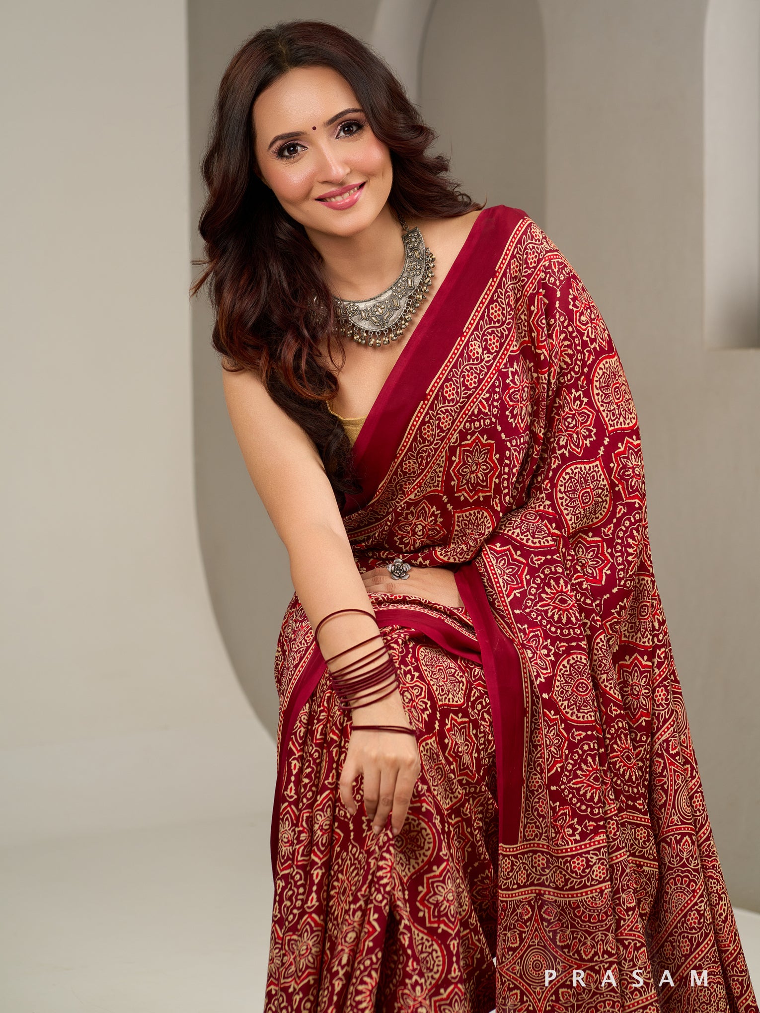 Gulzaar Garnet Ajrakh Modal Silk Saree.