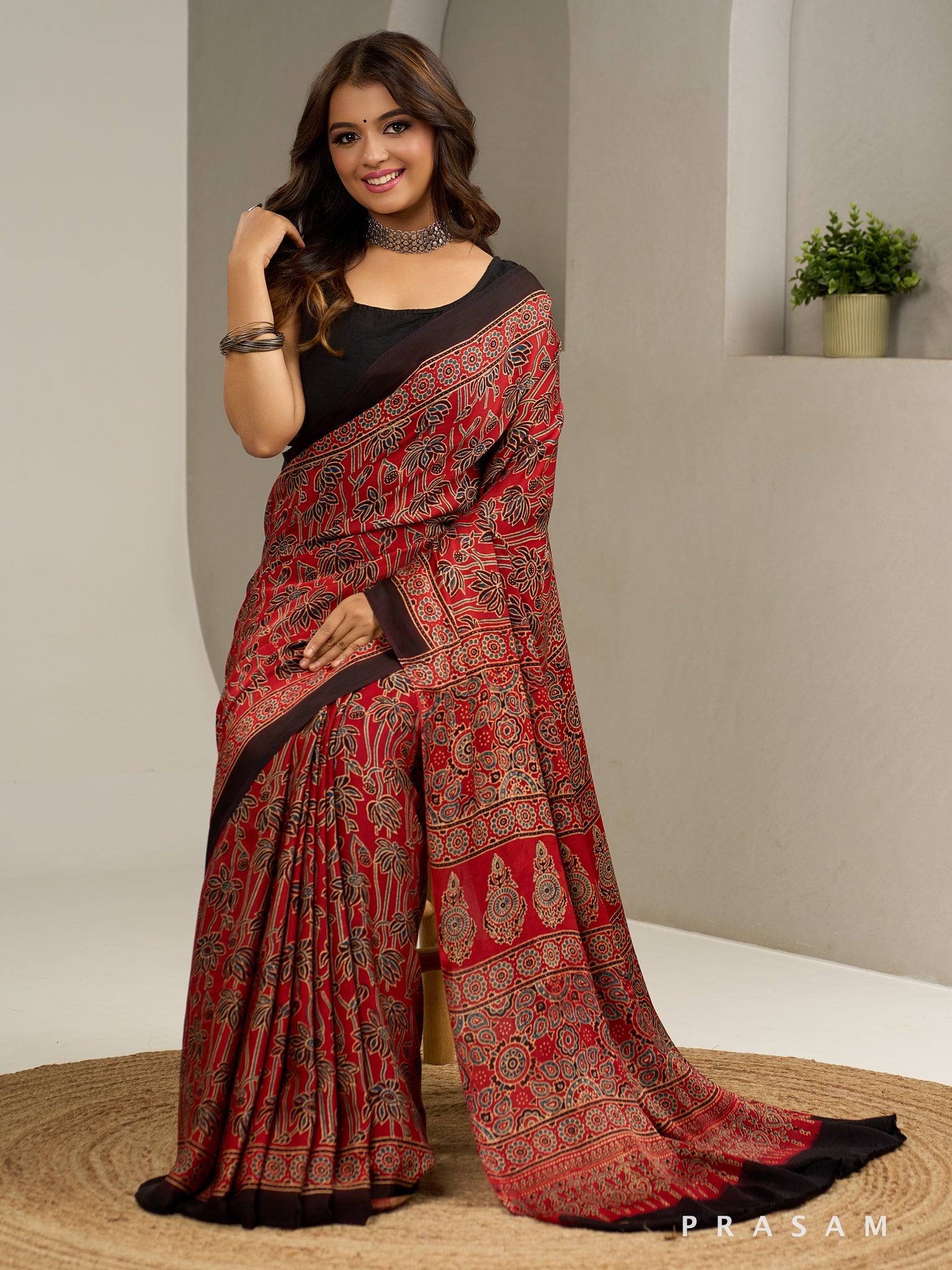 Rust Reverie Ajrakh Modal Silk Saree.