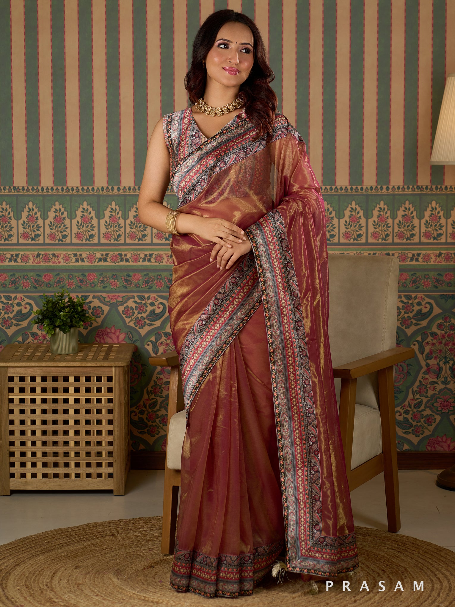 Silken Mirage Dual Tone Tissue Saree.