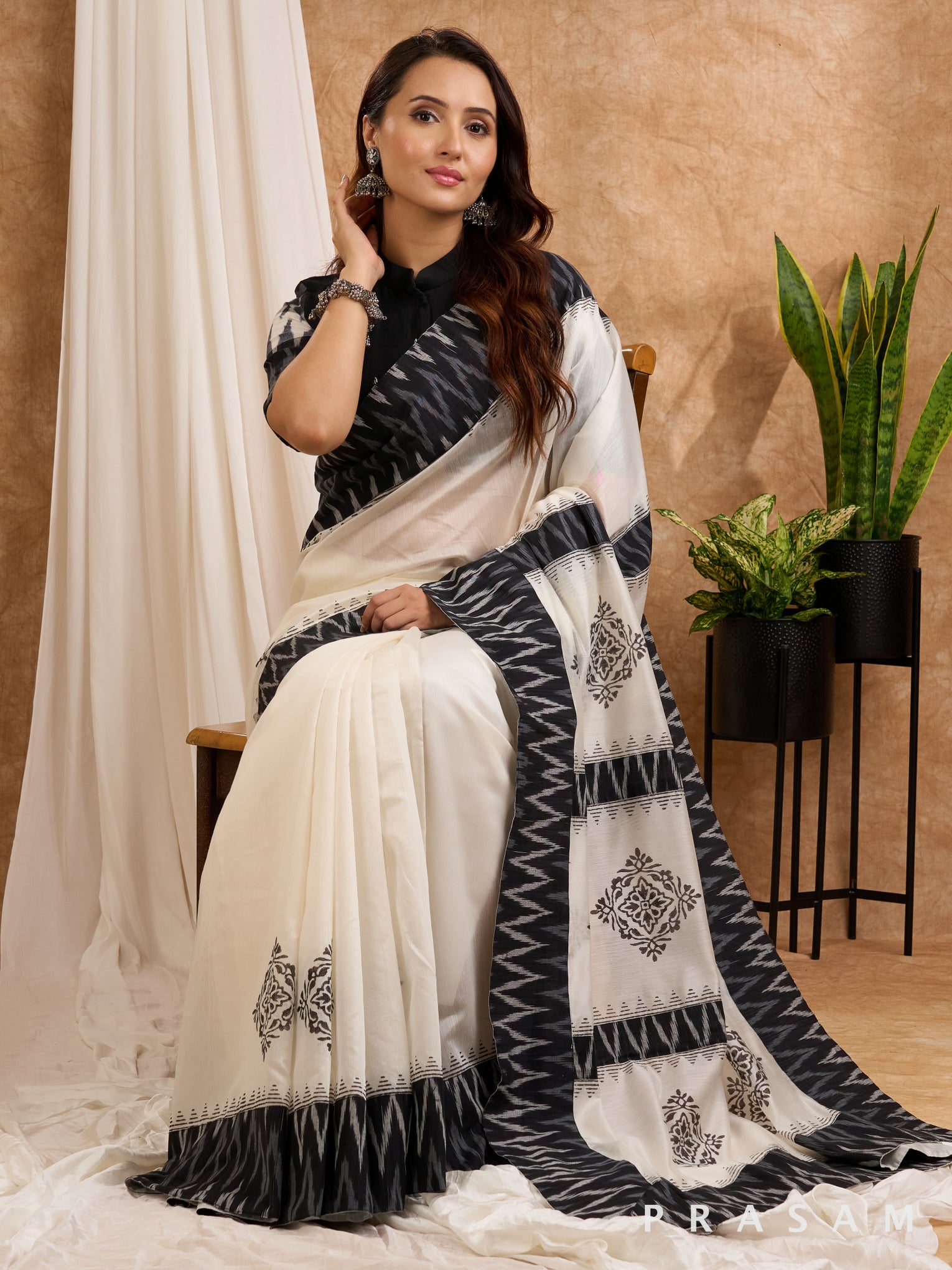 Mehtab-White Chanderi with Ikat Pallu and Ikat border saree