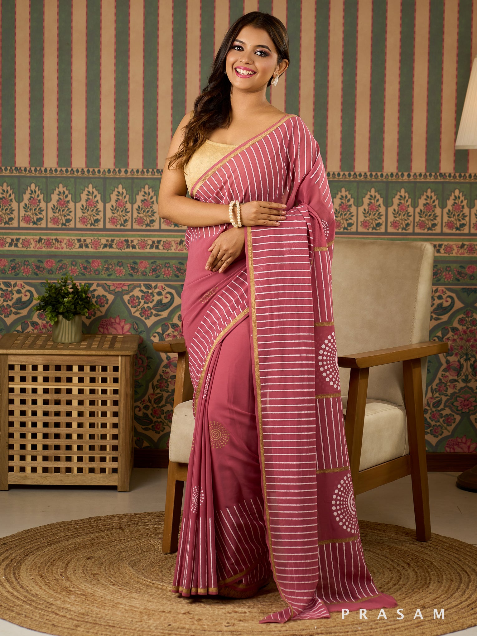 Rosy Rekha Georgette Saree With Gold And White Block Print.