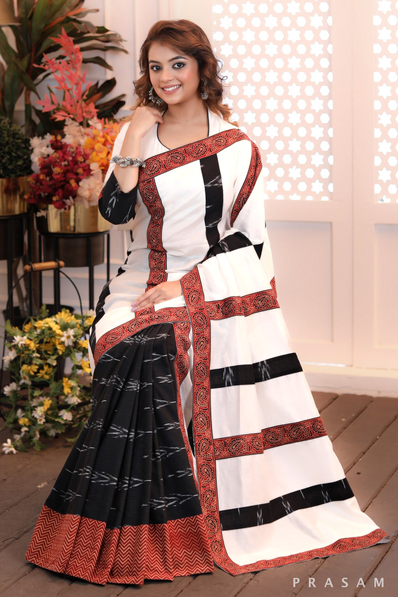 Heritage Harmony Ethnic white chanderi with ikat half and half saree with ajrakh border trims