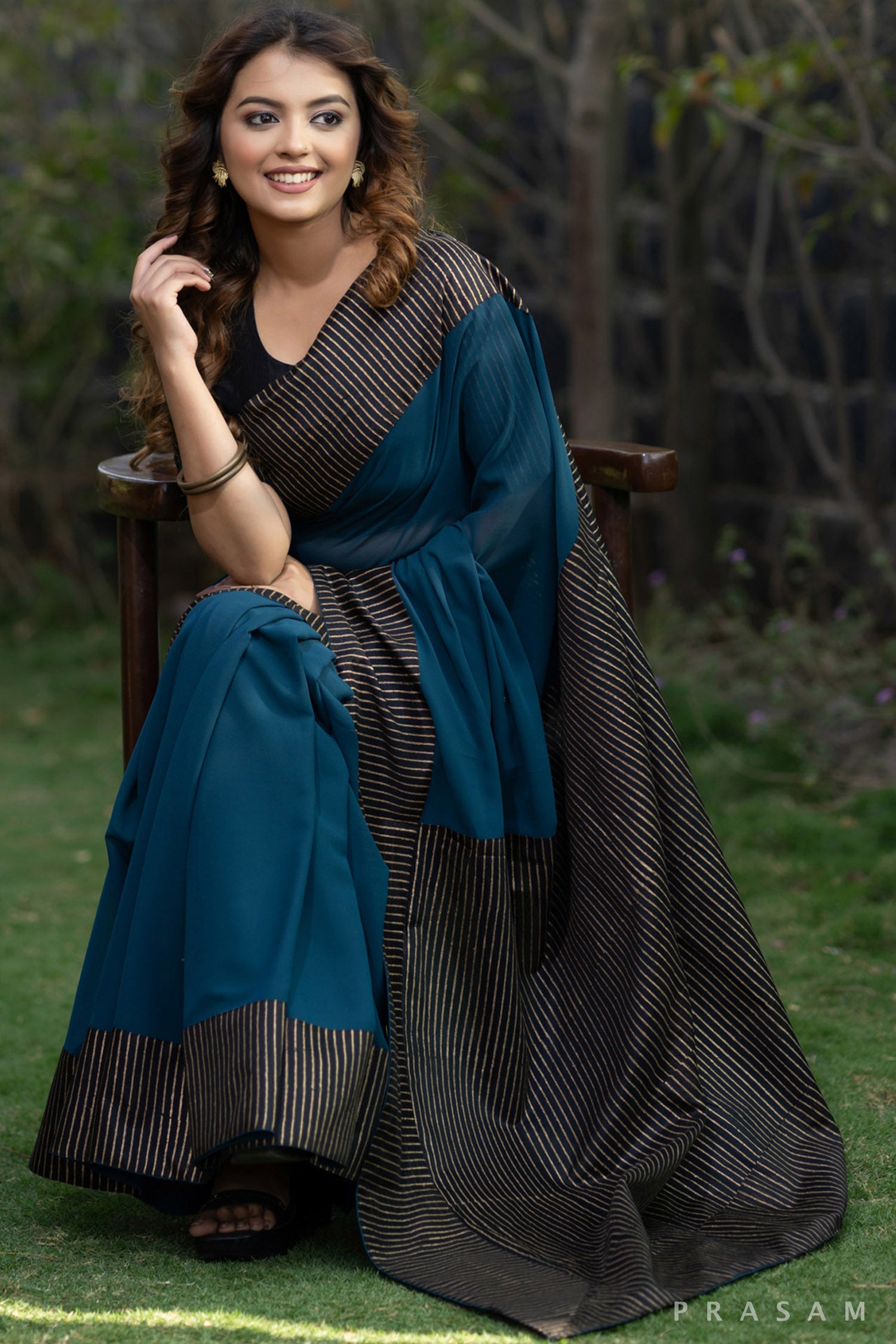 Sajun Teal Georgette Saree with Block Printed Pallu and Border