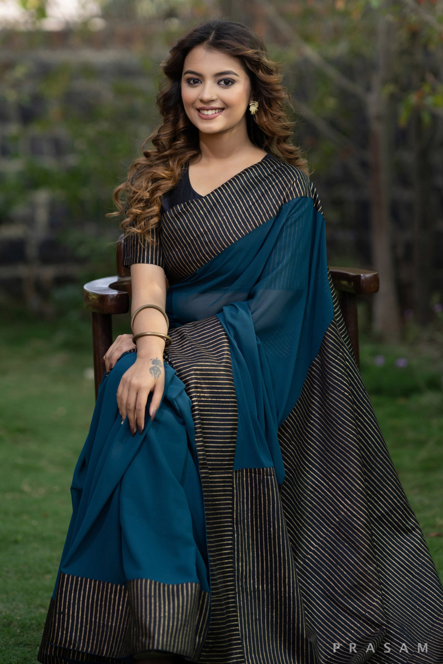 Sajun Teal Georgette Saree with Block Printed Pallu and Border