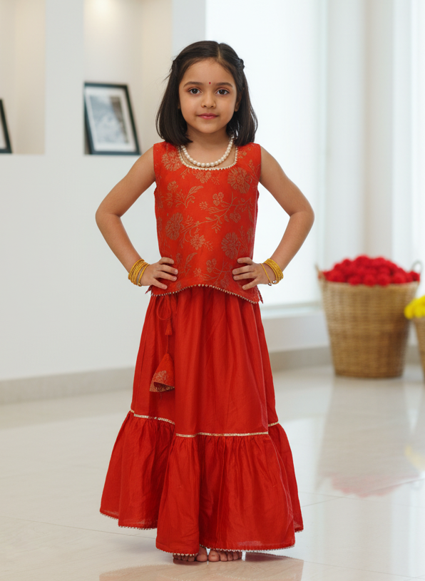 Let your little one shine in Prasam Crafts’ handcrafted Chanderi Cotton Silk skirt & top set. Featuring delicate block prints, this outfit brings together festive elegance and all-day comfort – perfect for joyful celebrations. 