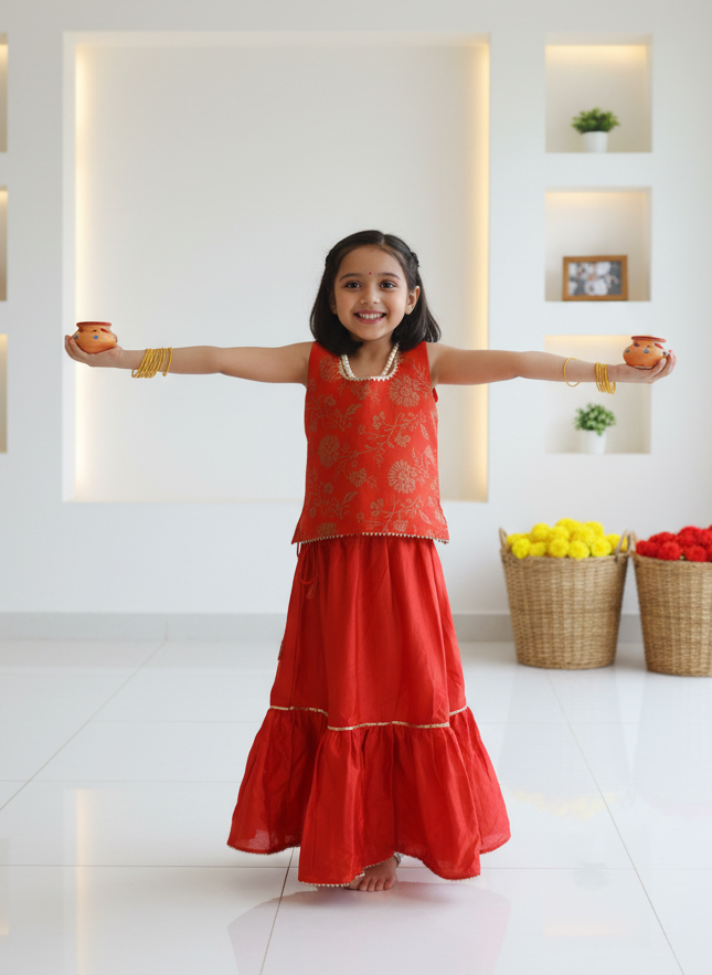 Let your little one shine in Prasam Crafts’ handcrafted Chanderi Cotton Silk skirt & top set. Featuring delicate block prints, this outfit brings together festive elegance and all-day comfort – perfect for joyful celebrations. 