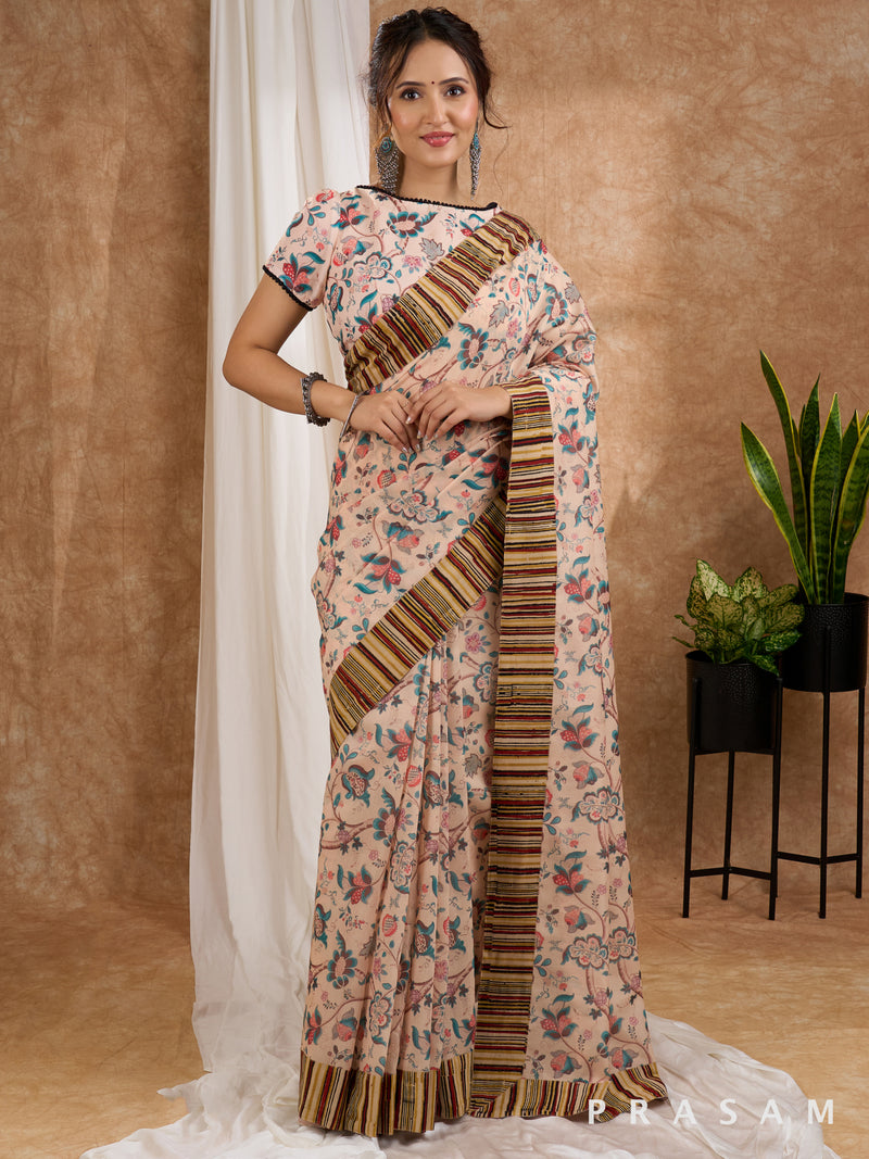 Safari Sunset- Beige Chanderi Printed Saree with Ajrakh Strip Border