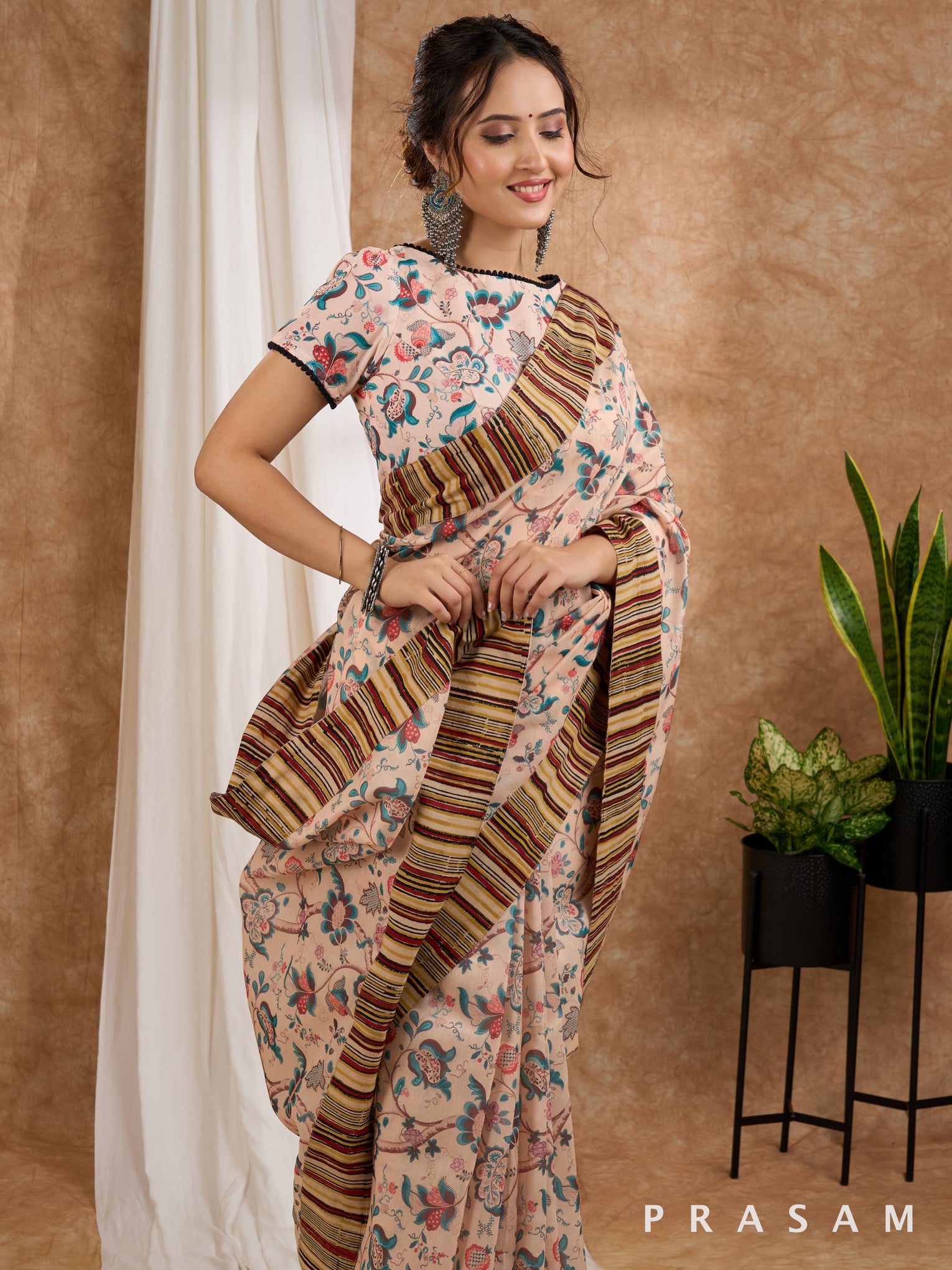 Safari Sunset- Beige Chanderi Printed Saree with Ajrakh Strip Border