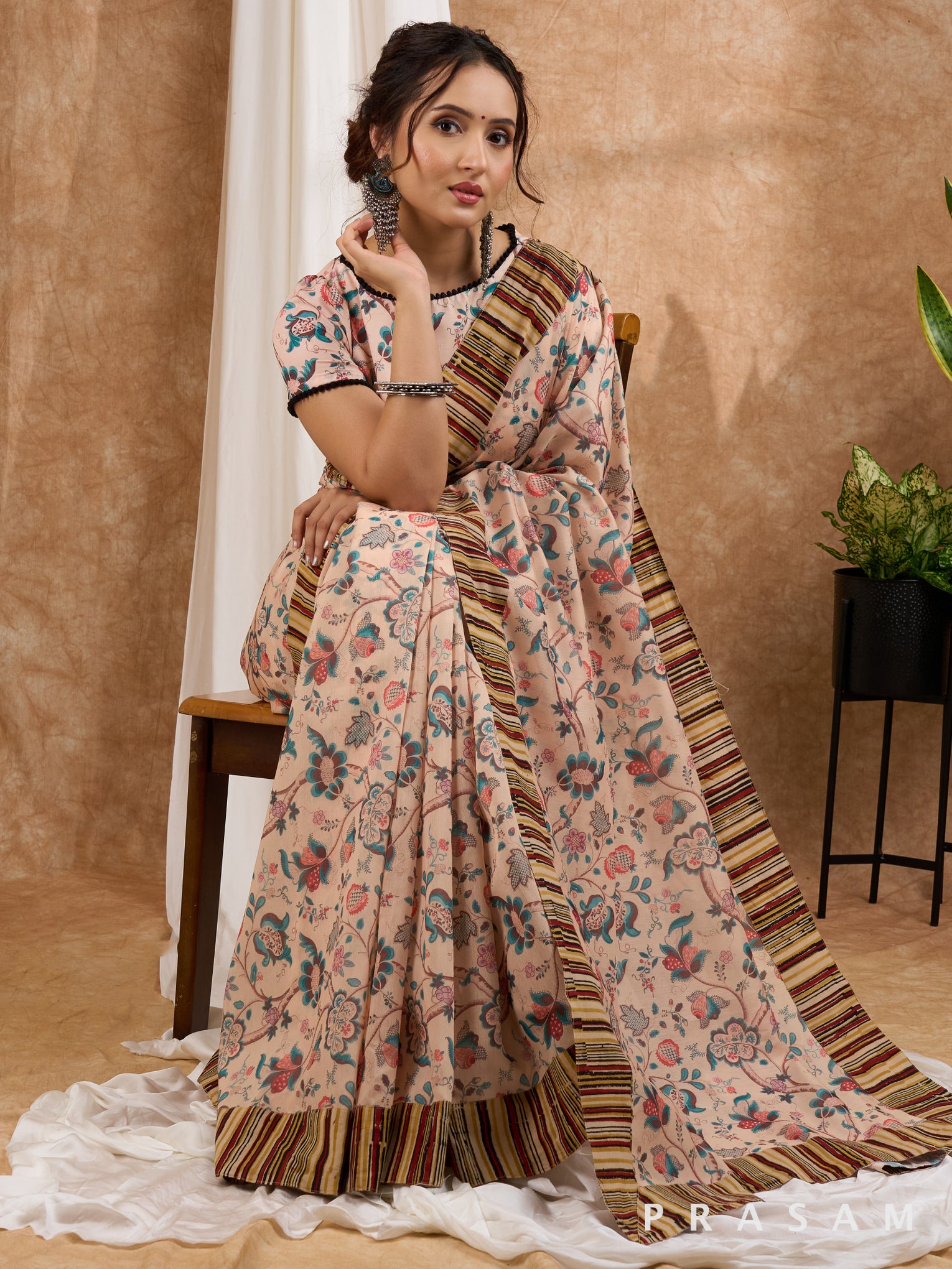 Safari Sunset- Beige Chanderi Printed Saree with Ajrakh Strip Border