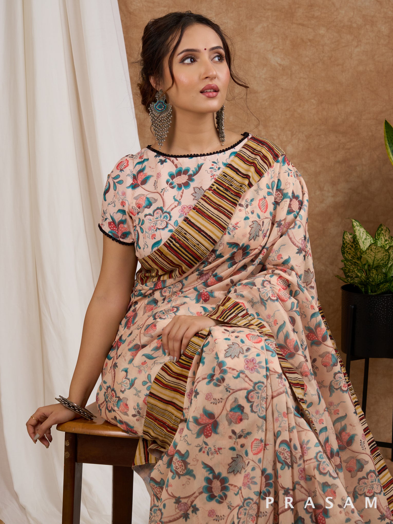 Safari Sunset- Beige Chanderi Printed Saree with Ajrakh Strip Border