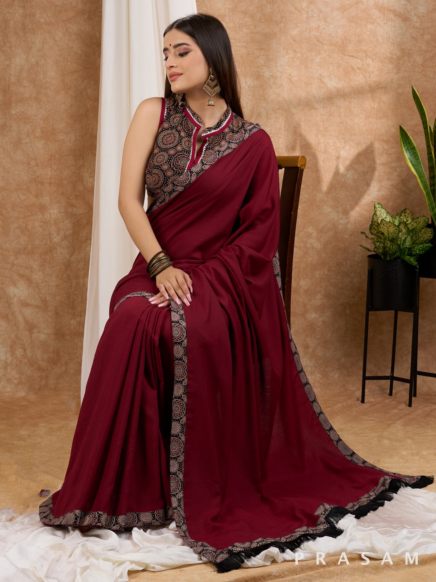 Isak - Maroon Muslin saree with Ajrakh border