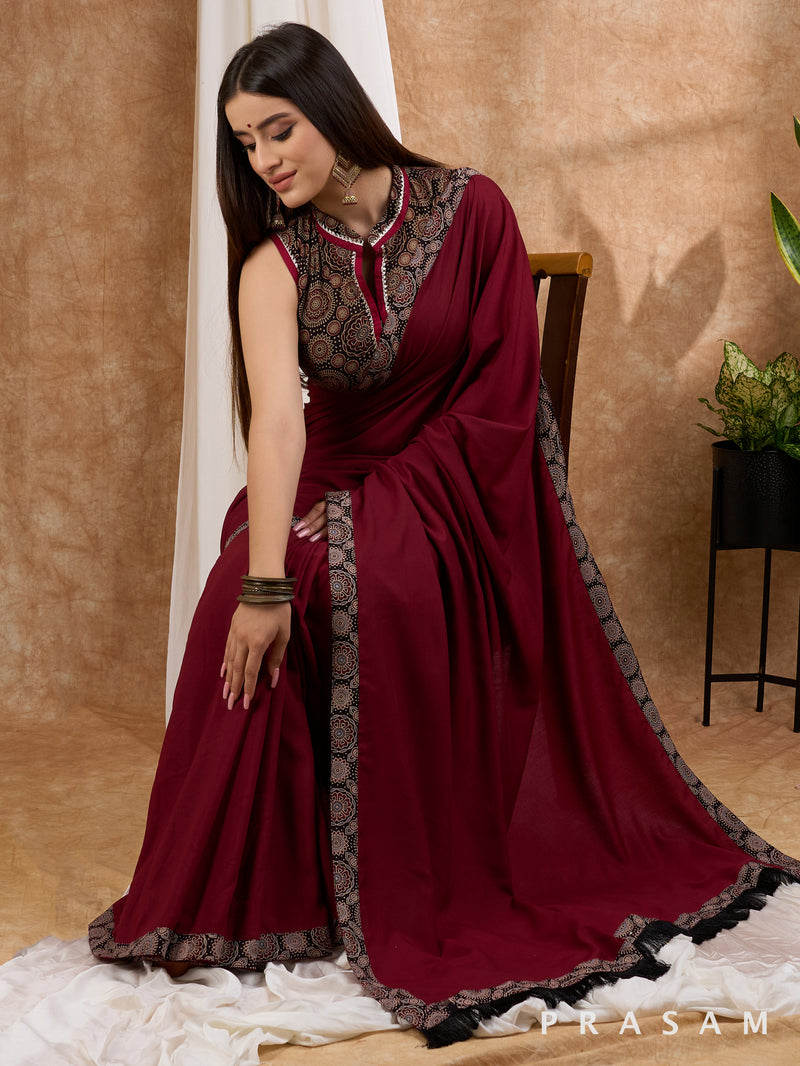 Isak - Maroon Muslin saree with Ajrakh border