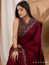 Isak - Maroon Muslin saree with Ajrakh border