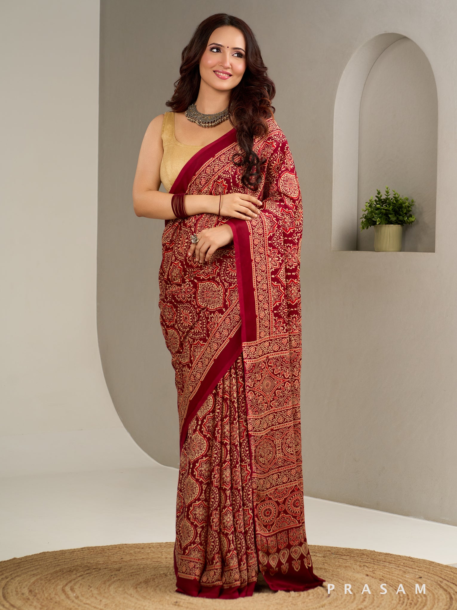 Gulzaar Garnet Ajrakh Modal Silk Saree.
