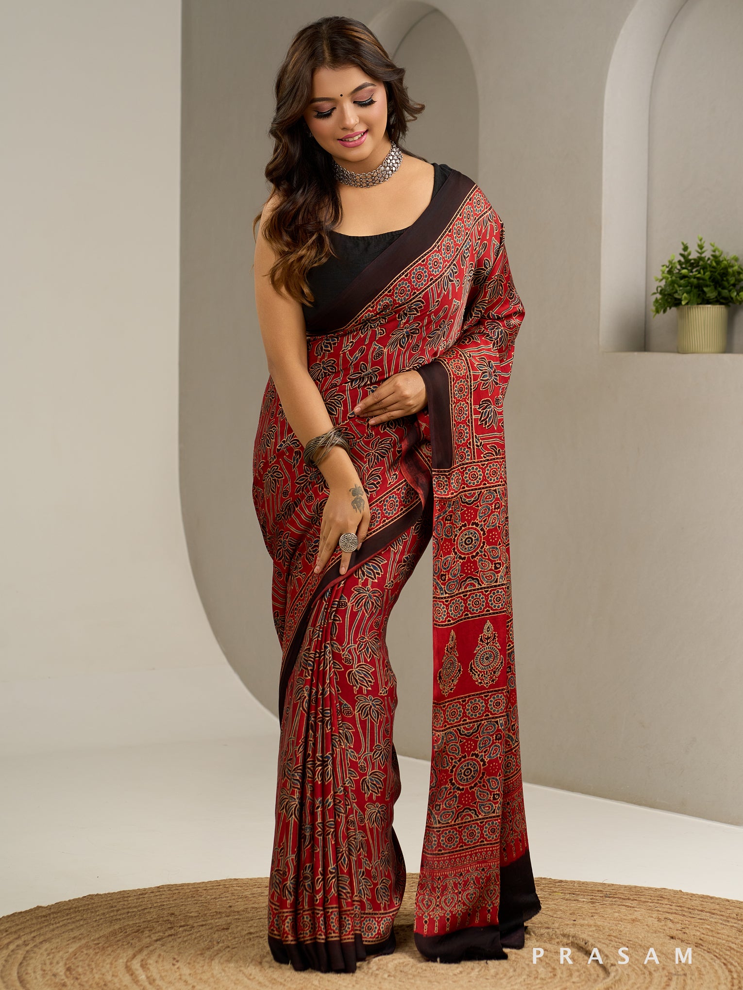 Rust Reverie Ajrakh Modal Silk Saree.