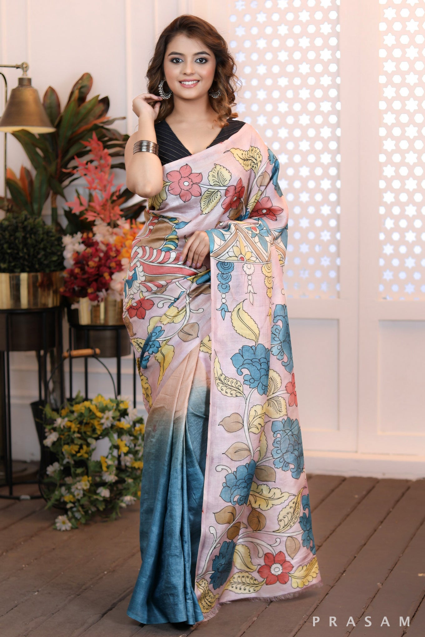 Blooming Threads Chic handpainted turquoise and pink silk saree