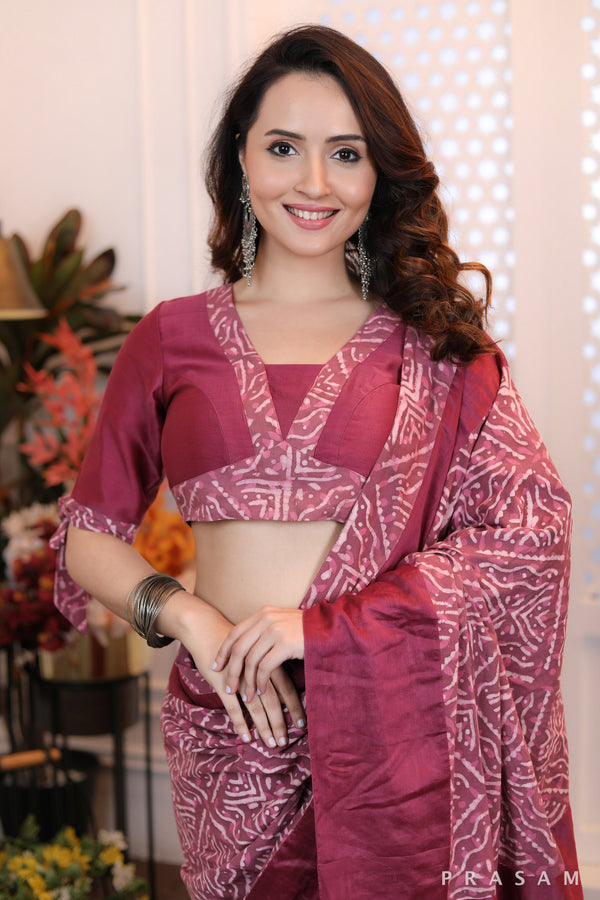 Stylishly crafted onion pink chanderi blouse with bagru trims