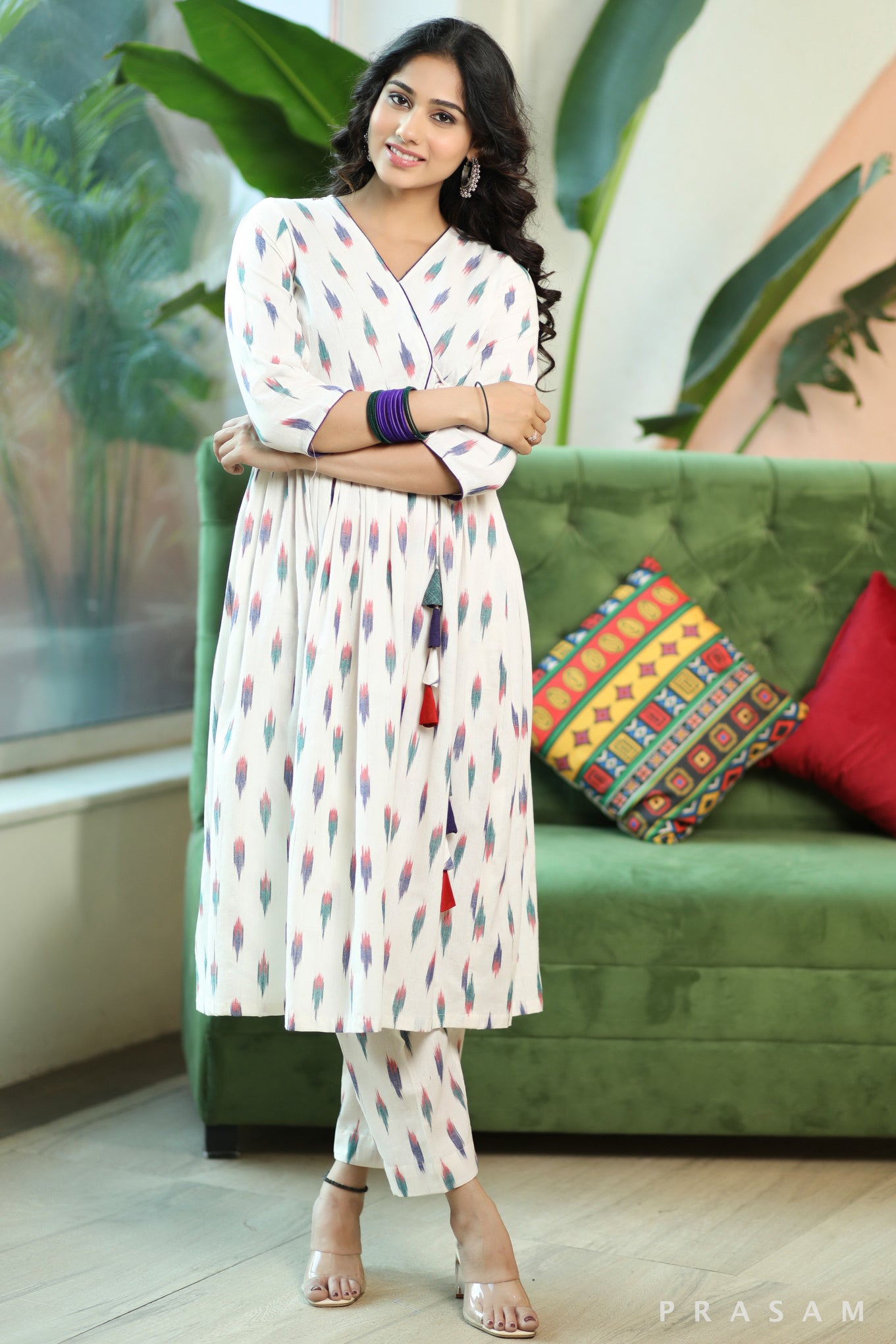 Vibrant Ikat Weaves Smart White And Colorful Ikat Angrakha Style Kurta Set