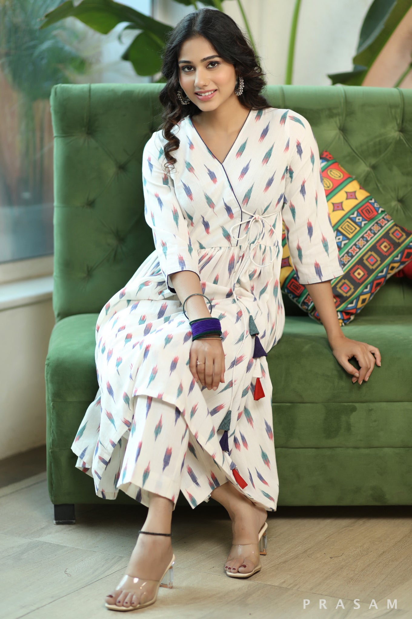 Vibrant Ikat Weaves Smart White And Colorful Ikat Angrakha Style Kurta Set