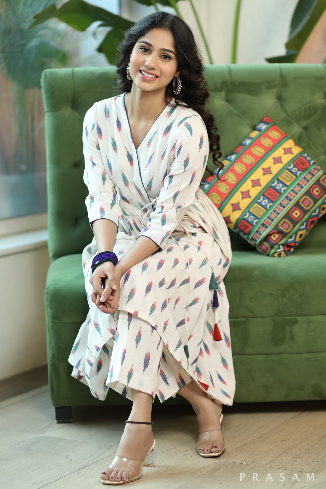 Vibrant Ikat Weaves Smart White And Colorful Ikat Angrakha Style Kurta Set