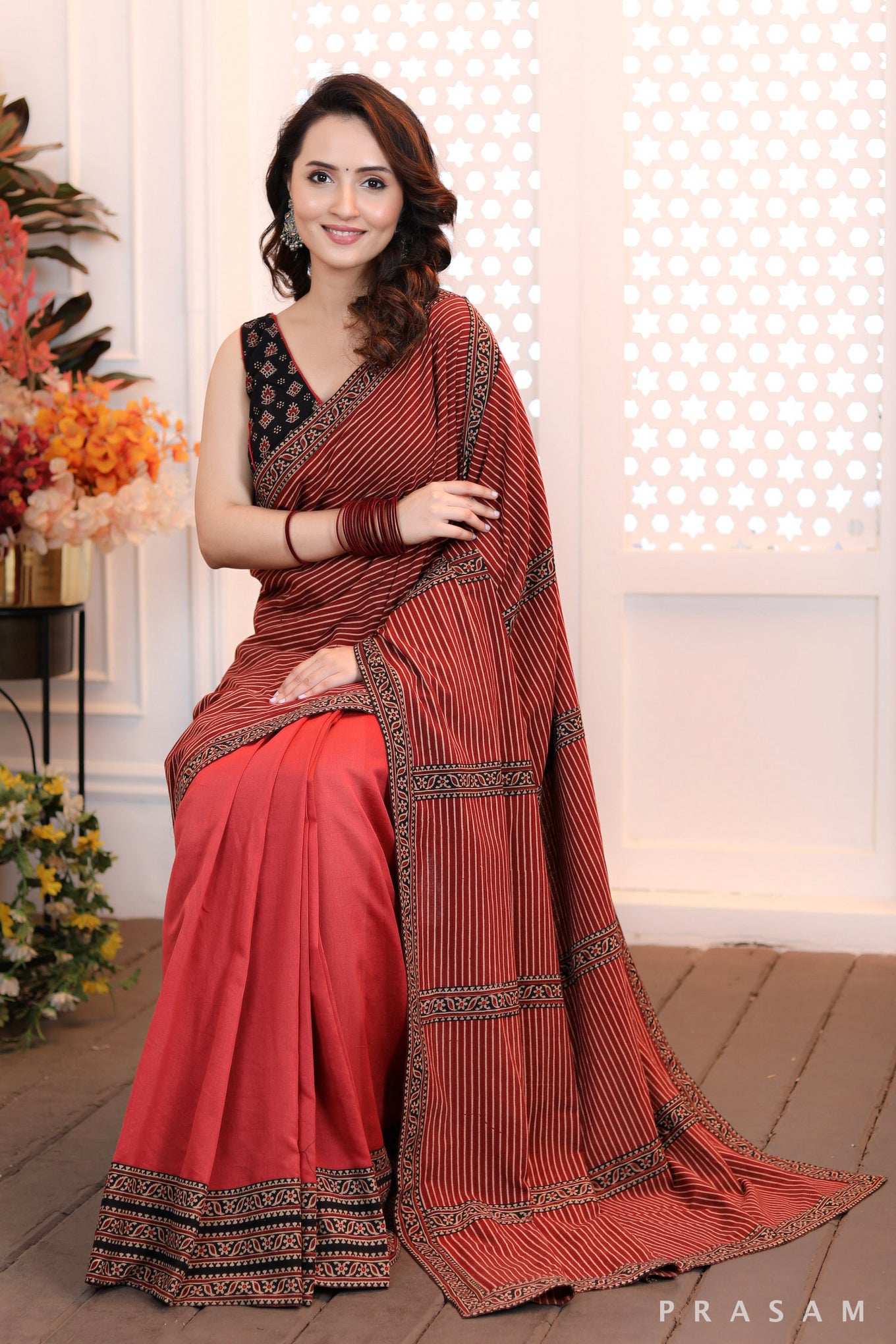 Autumn Radiance Stylish half and half chanderi & ajrakh brick coloured saree and ajrakh border trims (Readymade blouse optional)