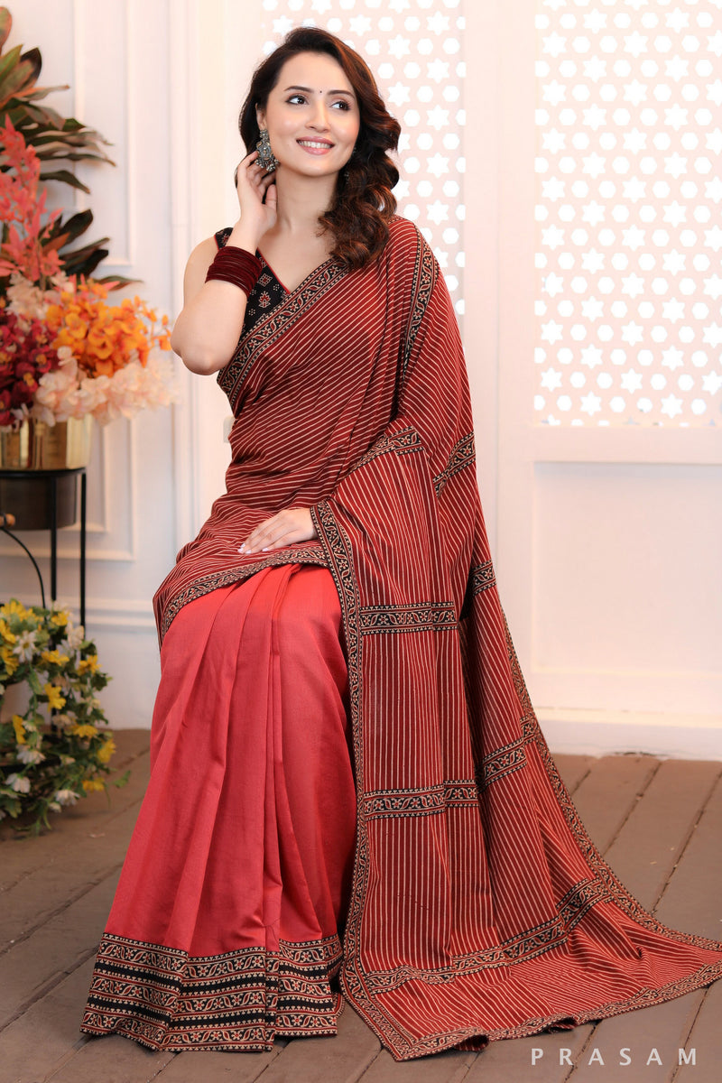 Autumn Radiance Stylish half and half chanderi & ajrakh brick coloured saree and ajrakh border trims (Readymade blouse optional)