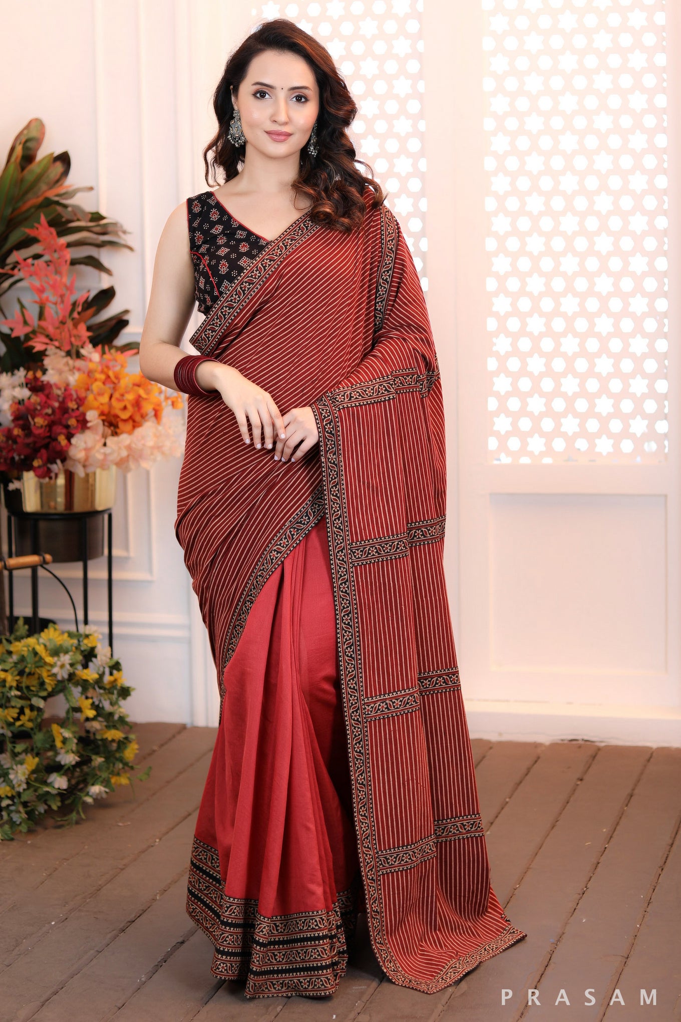 Autumn Radiance Stylish half and half chanderi & ajrakh brick coloured saree and ajrakh border trims (Readymade blouse optional)