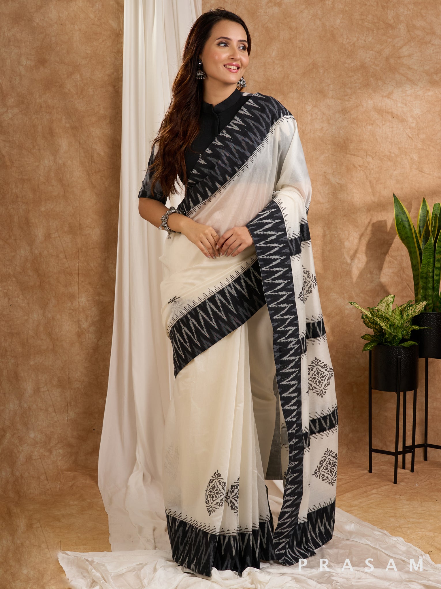 Mehtab-White Chanderi with Ikat Pallu and Ikat border