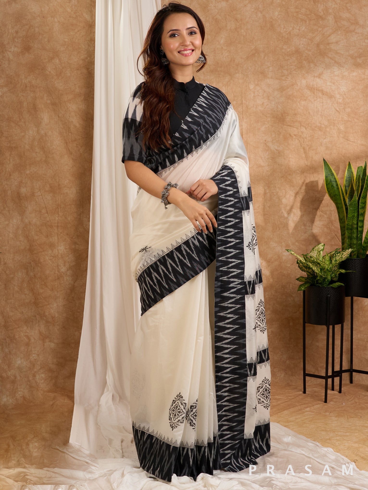 Mehtab-White Chanderi with Ikat Pallu and Ikat border