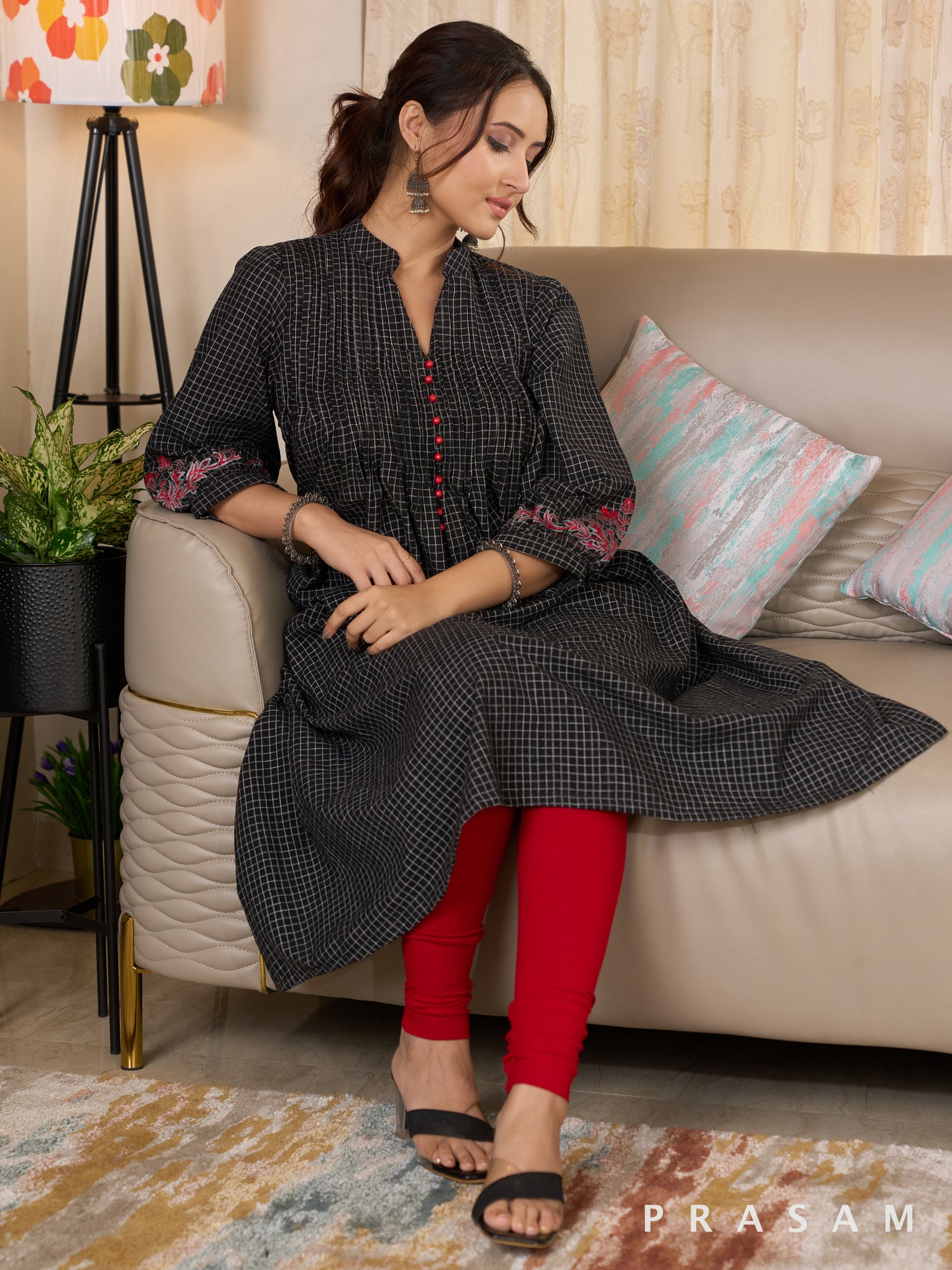 Embroidered Elegance Black Checks Pleated Kurti