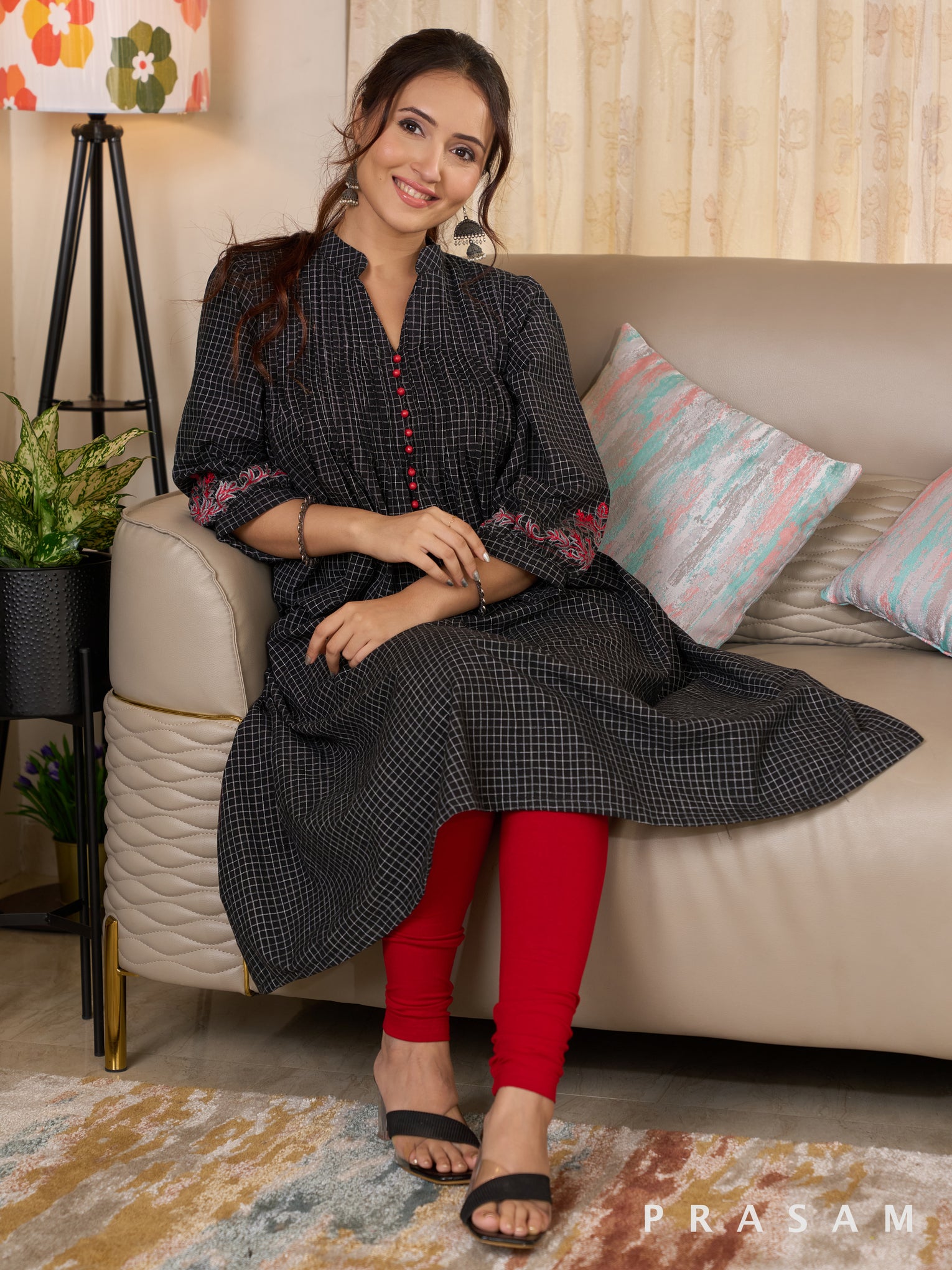 Embroidered Elegance Black Checks Pleated Kurti