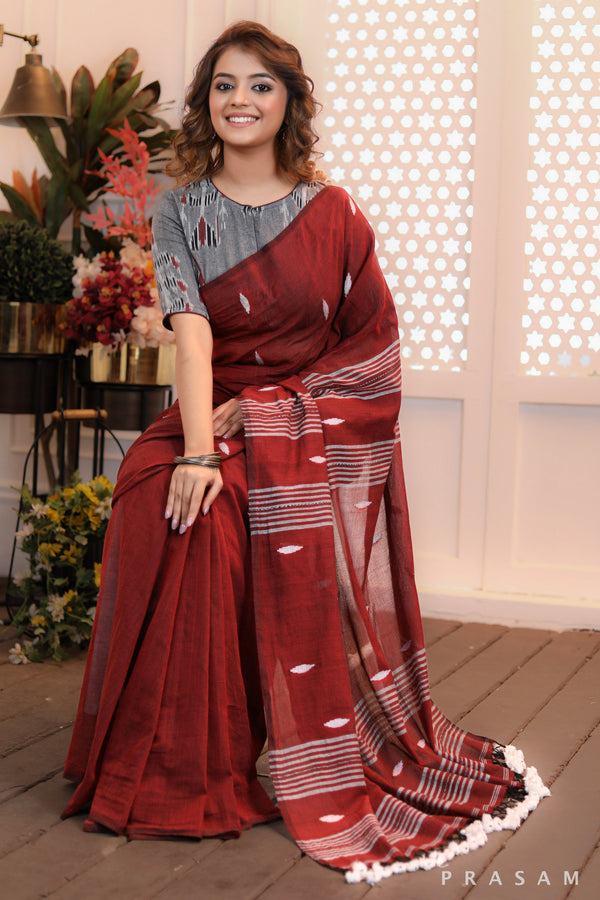 Majestic Maroon Beautiful maroon handwoven cotton saree