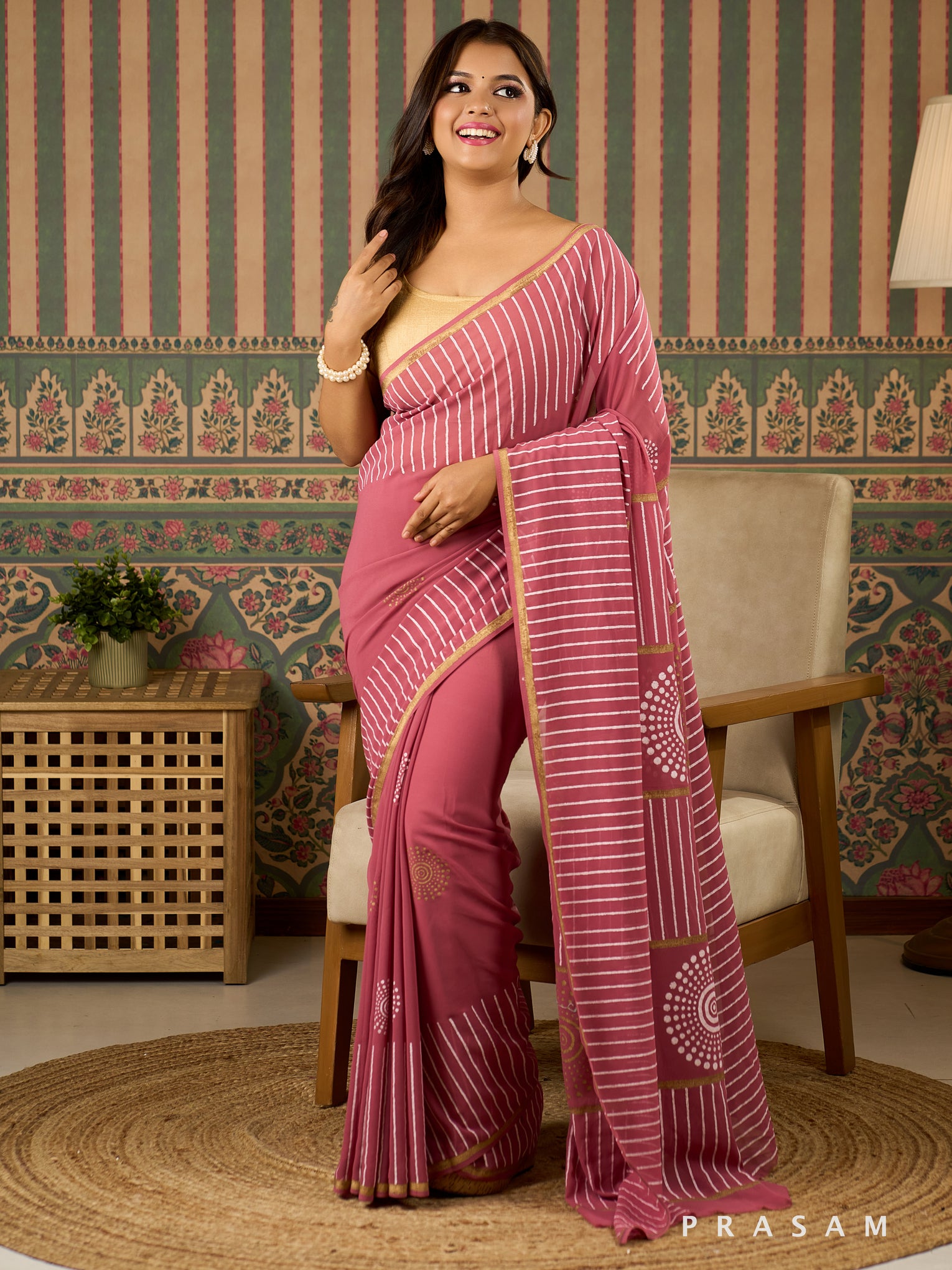 Rosy Rekha Georgette Saree With Gold And White Block Print.