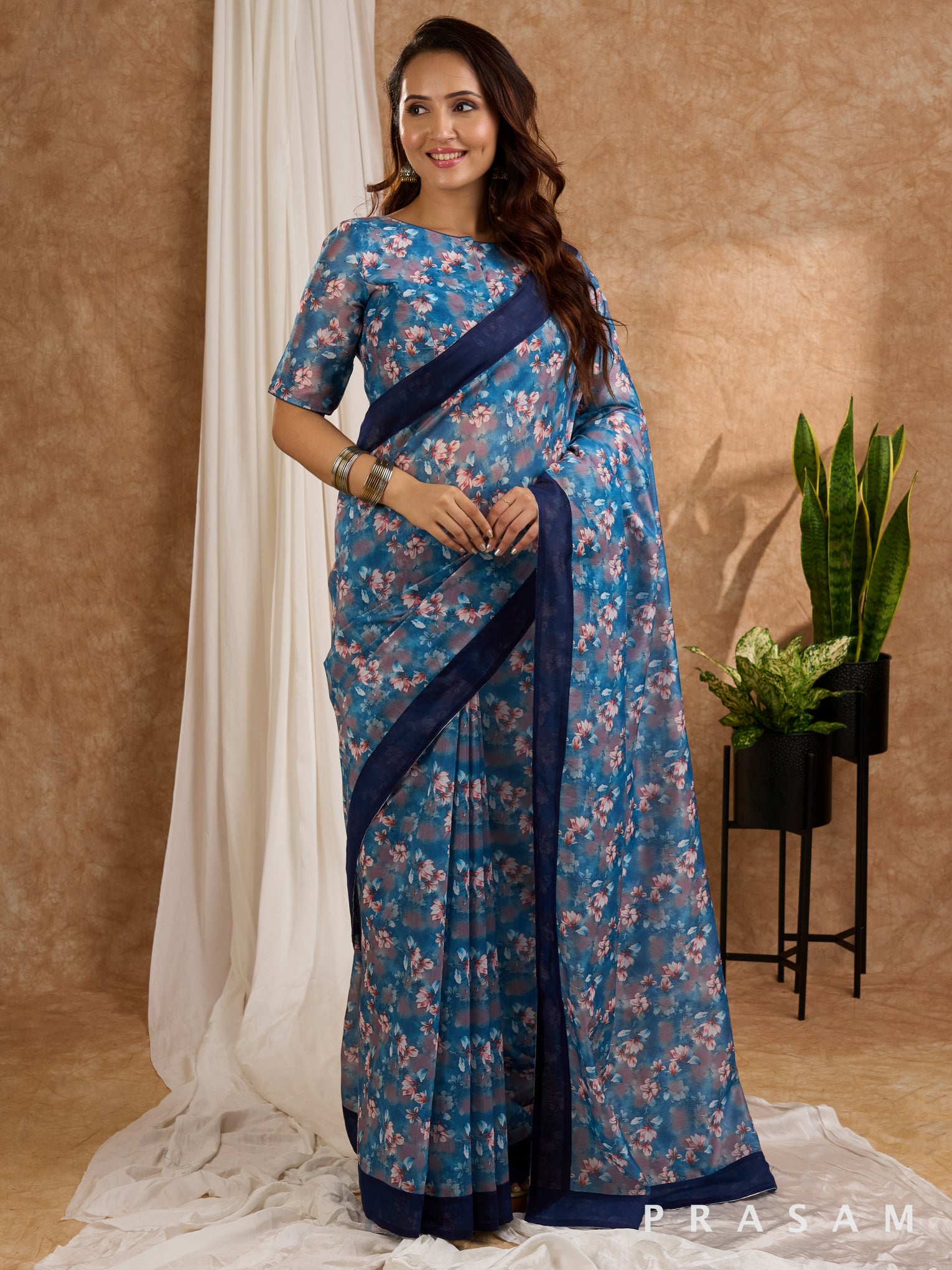 Neelam - Blue Floral Printed Chanderi Saree with Navy Border