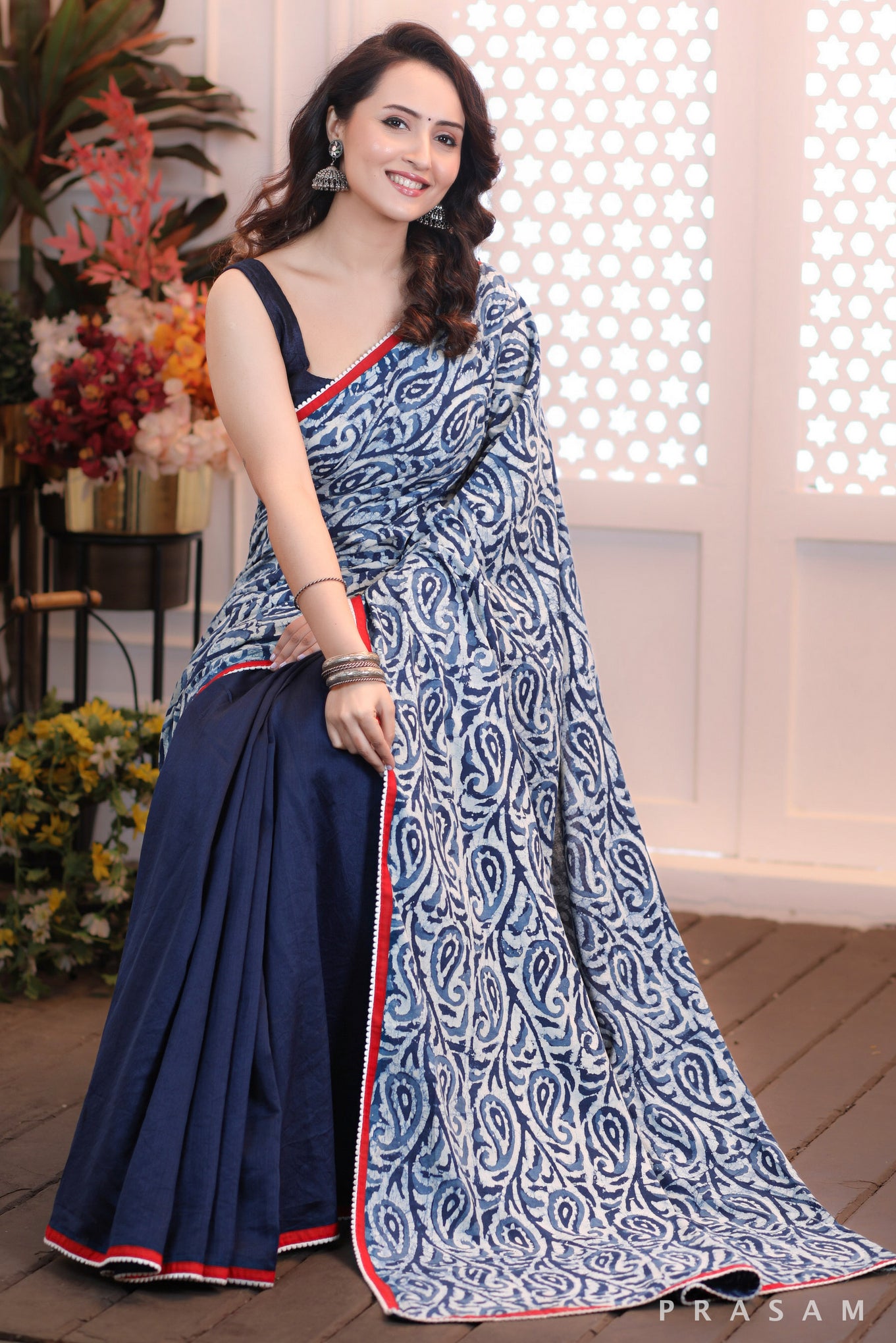 Ocean's Embrace  Stylish half and half cotton indigo and navy chanderi saree with red trims and lace