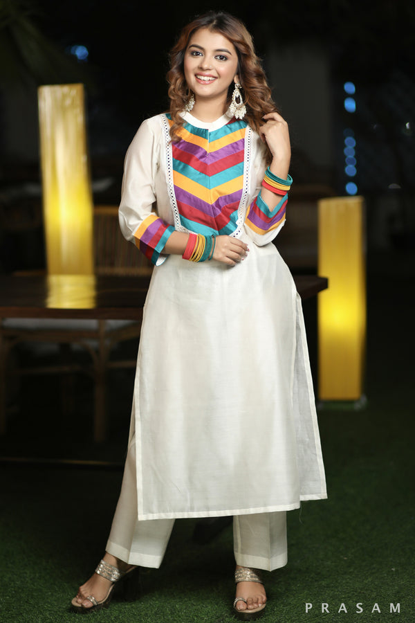 Celestial Elegance Glamorous Chanderi Silk Kurti With Multi Coloured Trims And Lace Details  (Pants Optional)