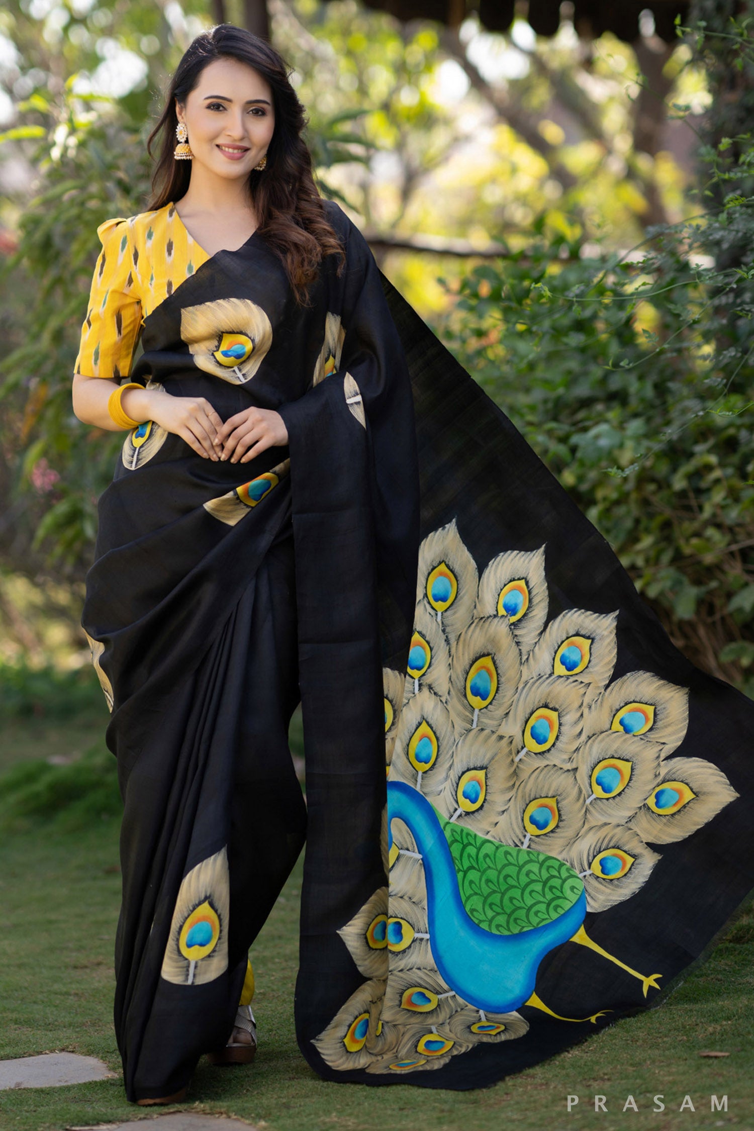 Mayuri glorious peacock hand painted black pure silk saree