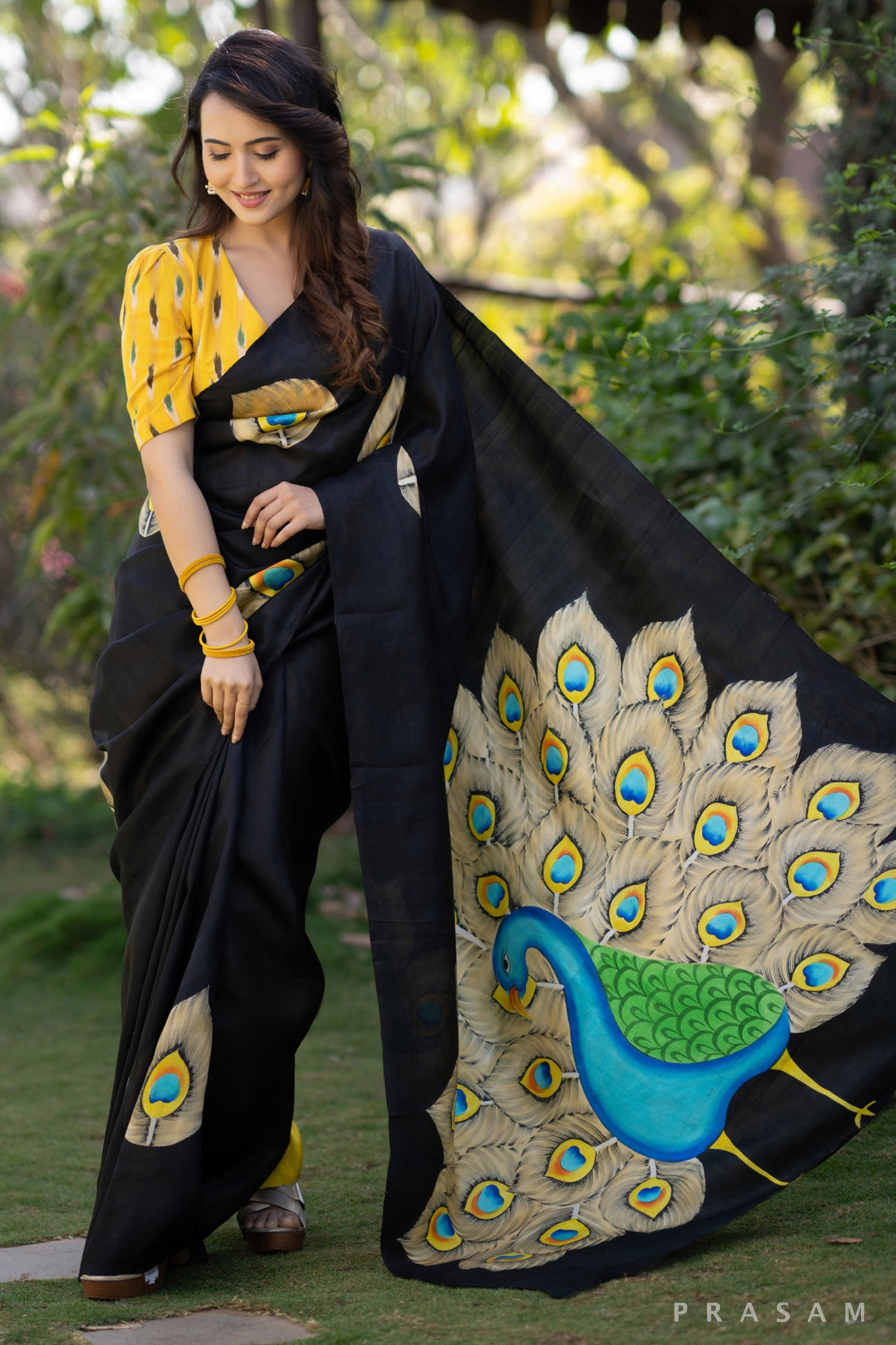 Mayuri glorious peacock hand painted black pure silk saree