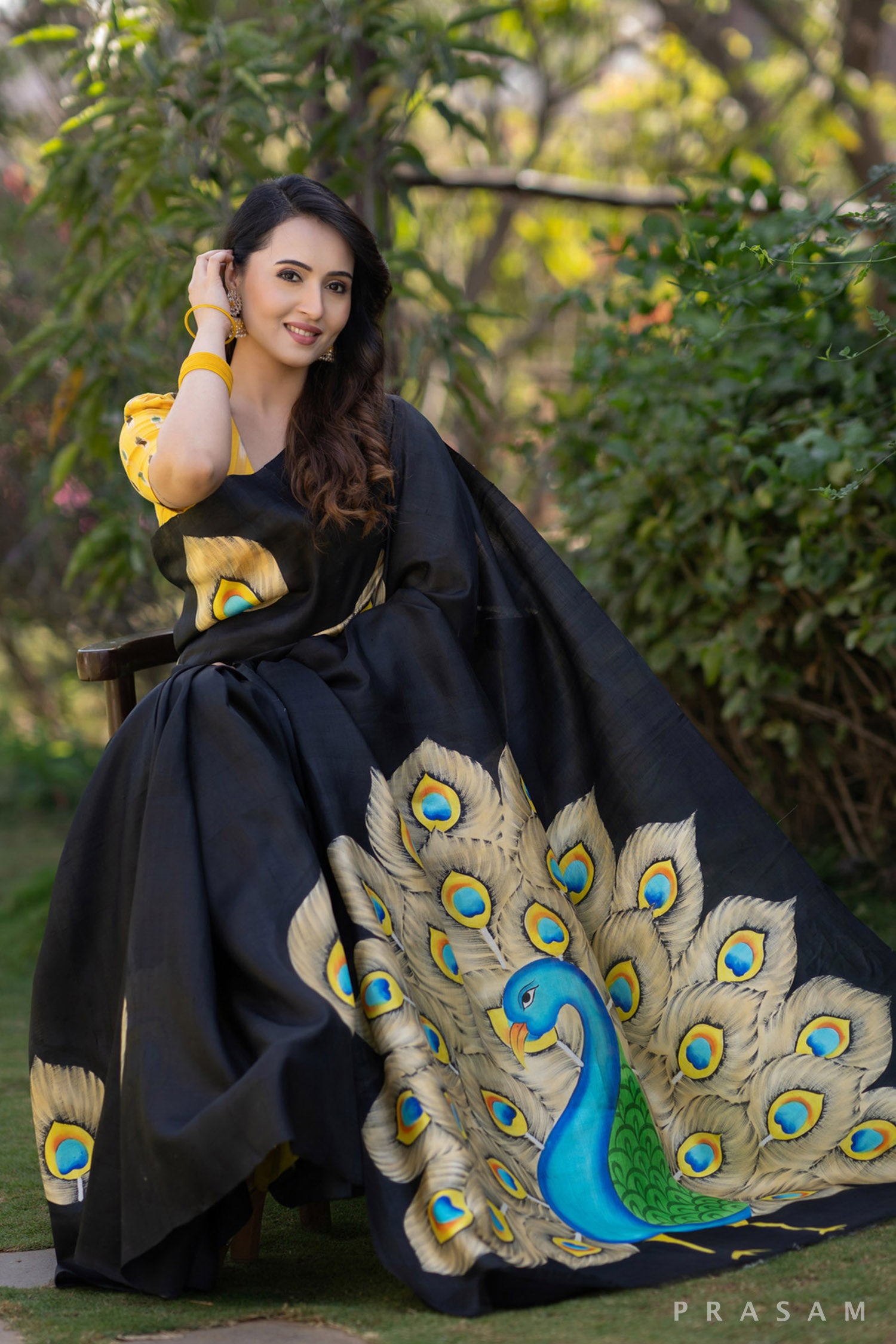 Mayuri glorious peacock hand painted black pure silk saree