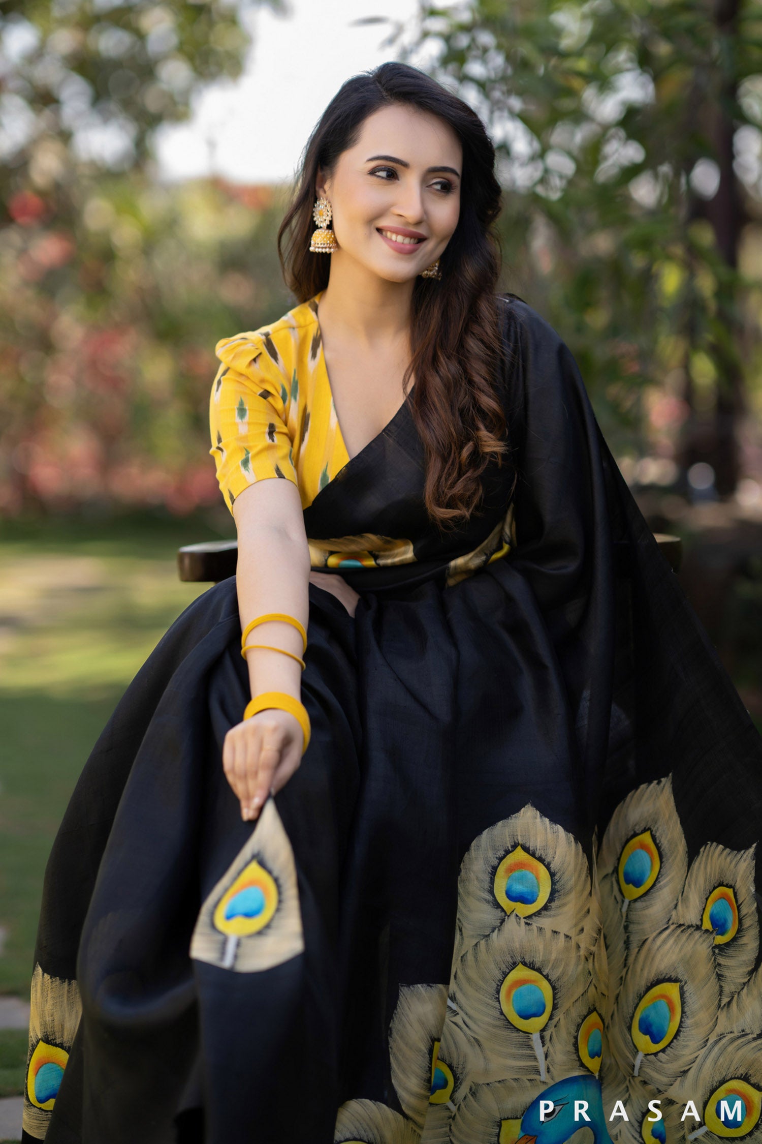 Mayuri glorious peacock hand painted black pure silk saree