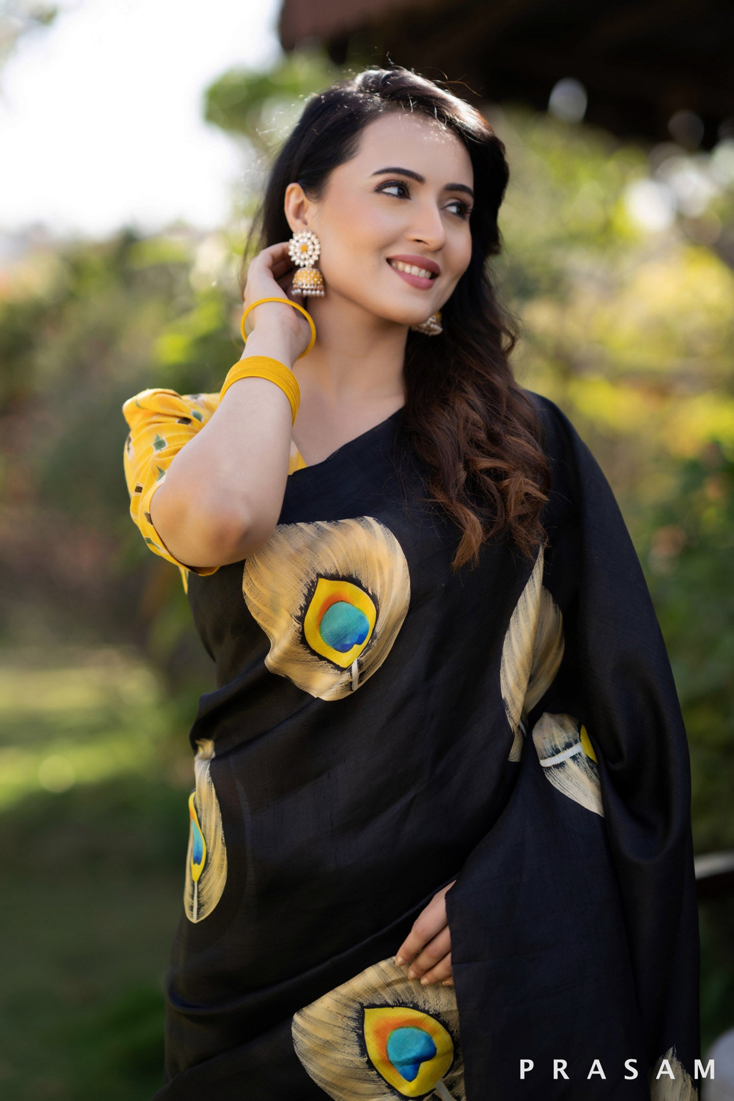 Mayuri glorious peacock hand painted black pure silk saree