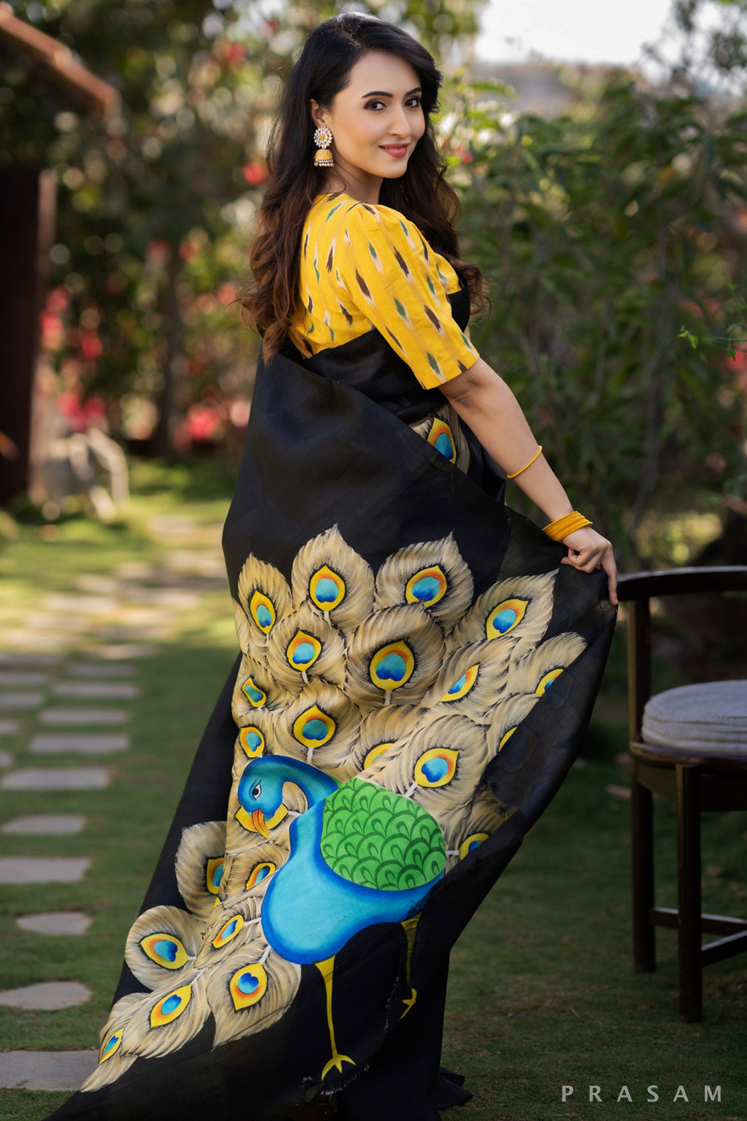 Mayuri glorious peacock hand painted black pure silk saree