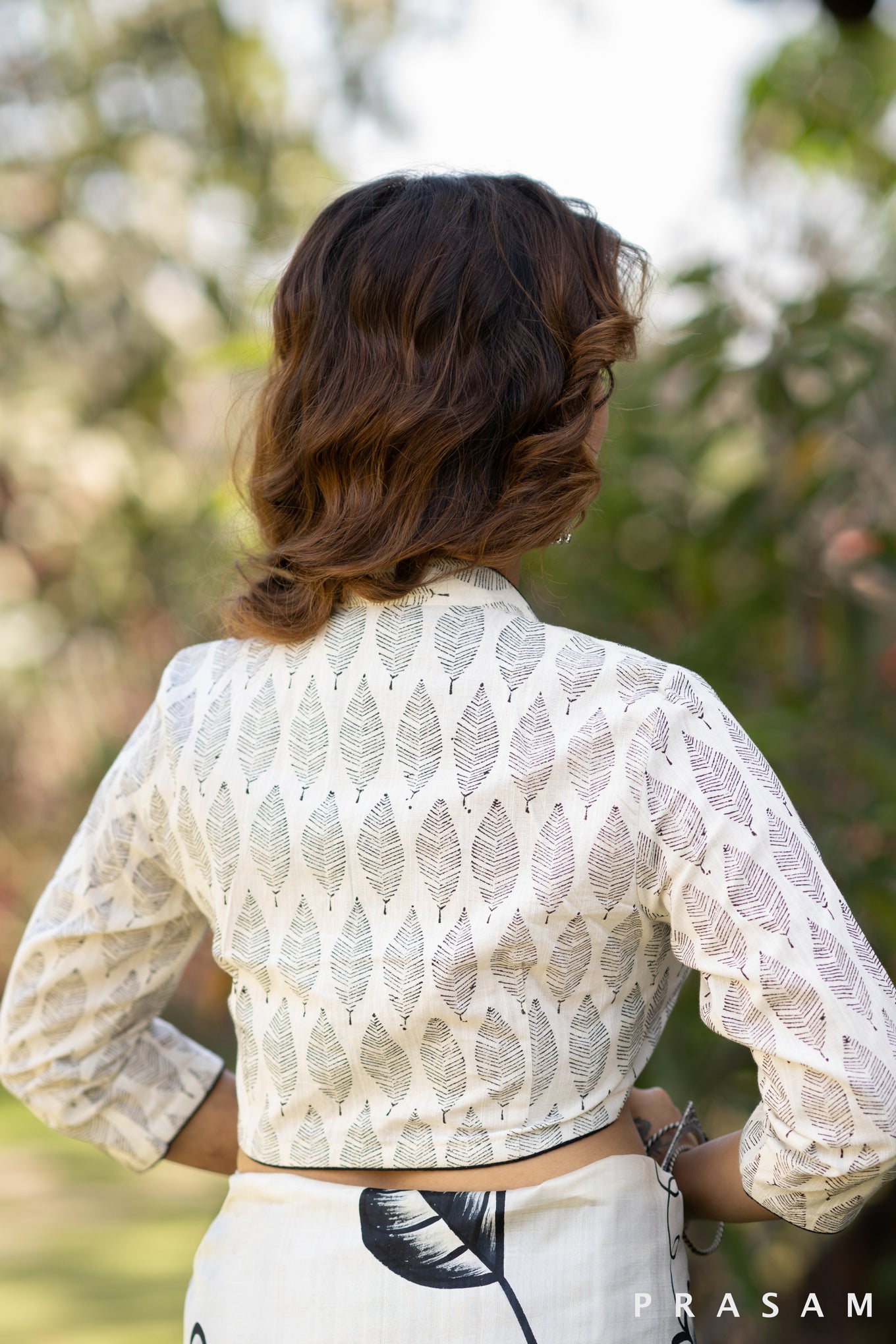 Off white block printed 3/4th sleeve blouse with black piping