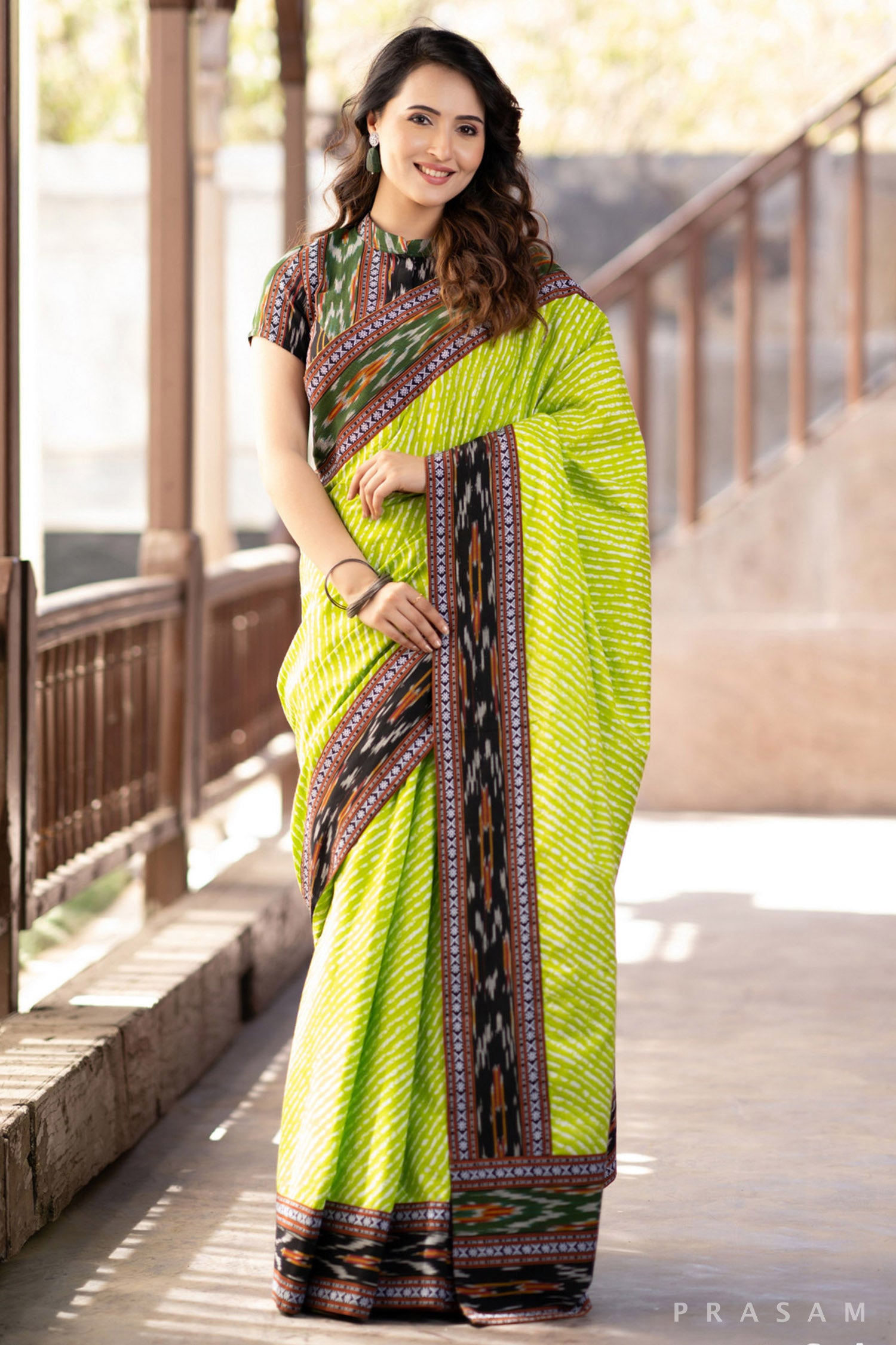 Indy Bliss Green leheriya mul saree with ikat border