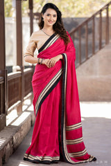 Blossom Rani pink muslin saree with ajrakh borders